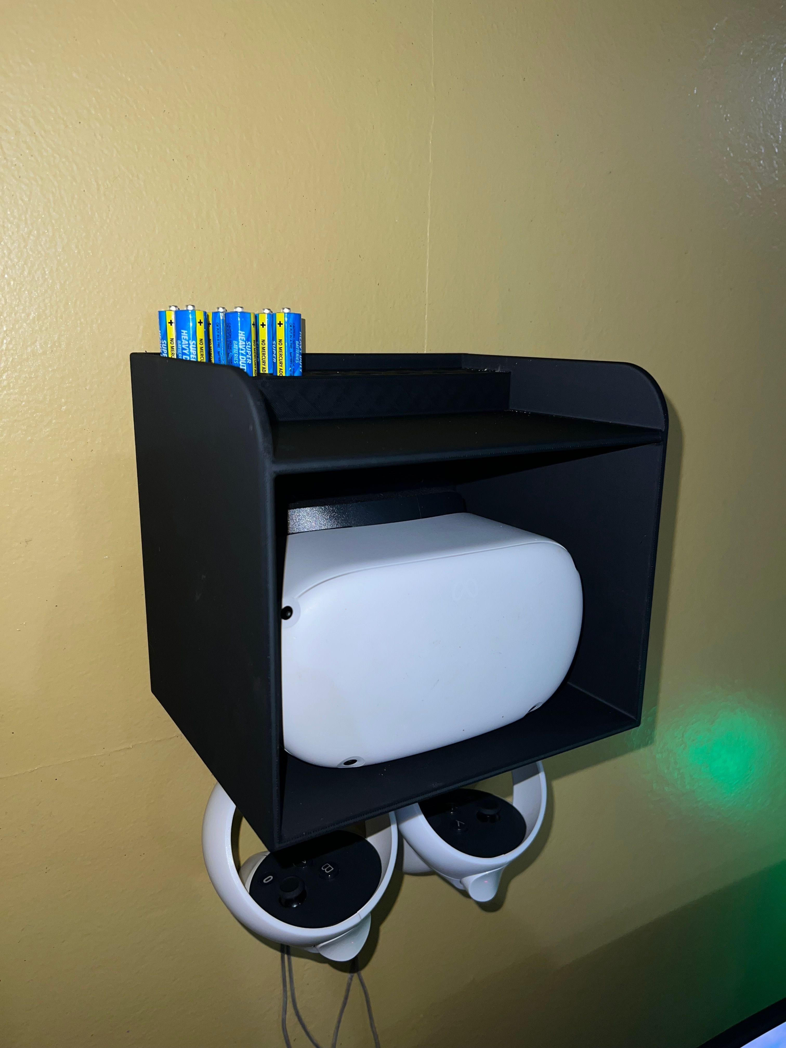 Wall mount Oculus shelf with battery storage - Print in place 3d model