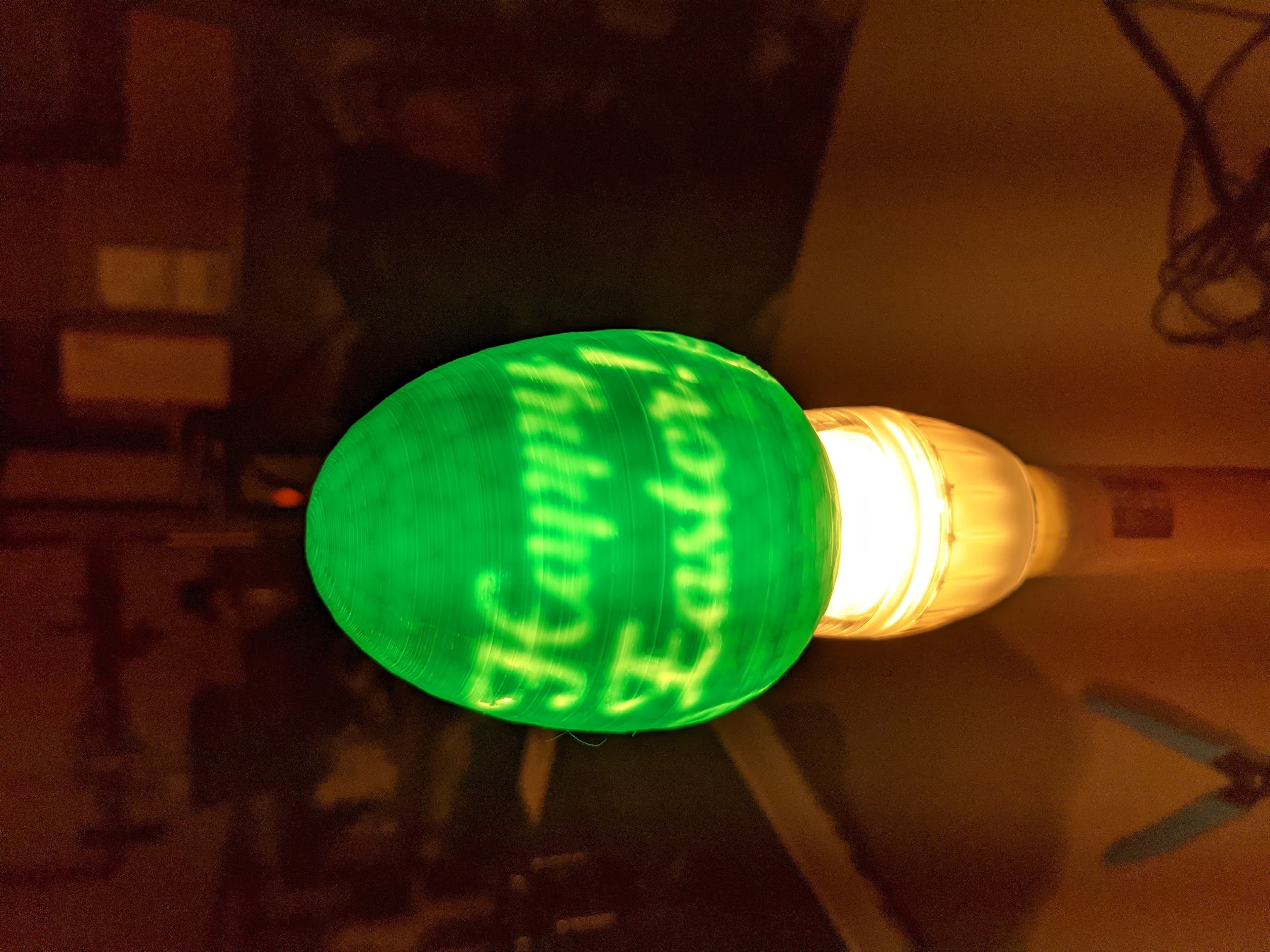 Scaled down by 75% so it wasn't quite so large. Overall it worked, but around the H on Happy it got thin on the outer wall and showed through. Same with one of the eggs on the right side. This could be just because I sized it down too much.
The opening in the bottom just fit one of our battery tea-lights so it has an easy way to glow!