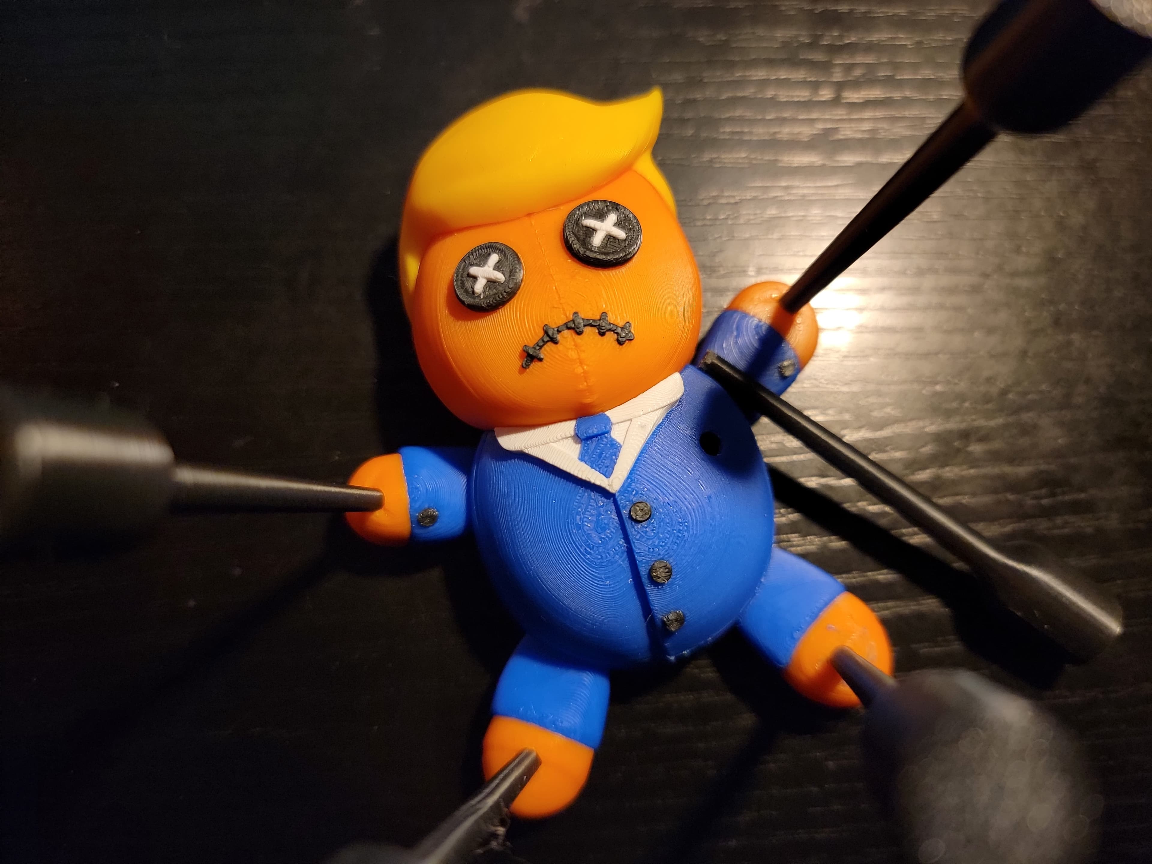 Hi! I just purchased this 5 days ago, and there were some odd issues with the file, but it was a good learning experience for me. I was able to print out the voodoo doll/pins version, and it looks great.
I did have a problem with the pins easily breaking off inside the holes, so I'm doing a test with some PETG for the pins to see if that helps.
Fun print though!