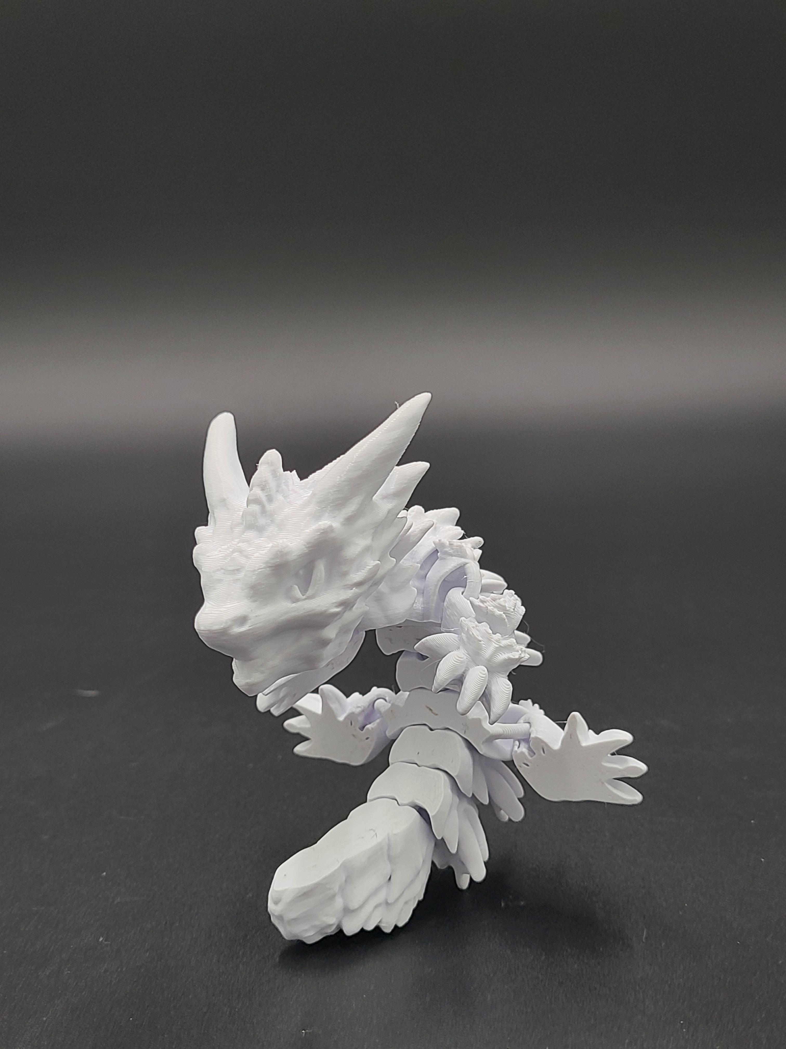 Frostbite, Winter Dragon Child - Articulated Snap-Flex Fidget (Medium Tightness Joints) 3d model