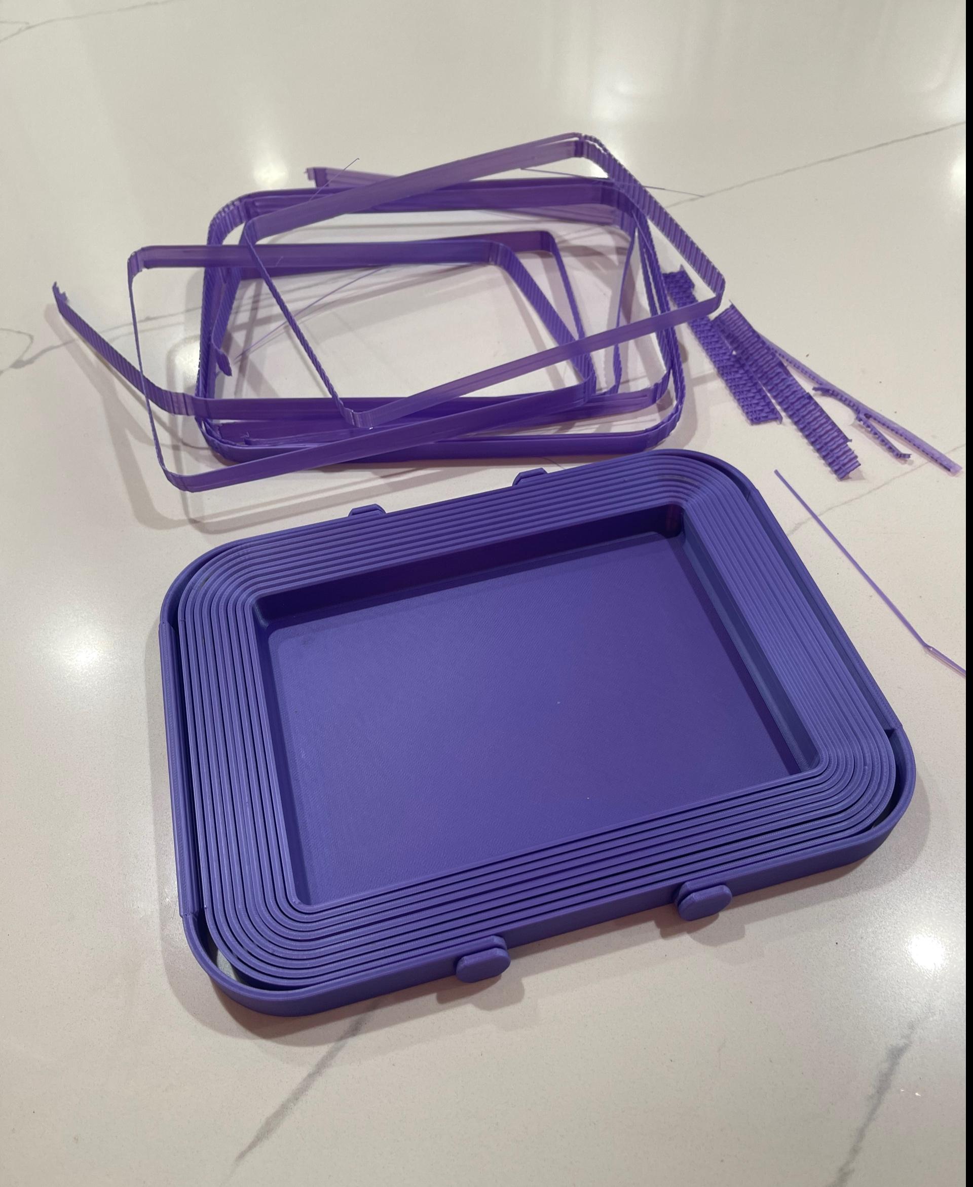 Collapsible Picnic Basket.stl - I printed this on my Prusa 3+ and it was my most trying print thus far. I tried with PETG but it clumped and crashed. I switched to PLA and readjusted the first layer to stick better and it worked. Mine said it recommended supports so that is what the bands are in the photo. They were easy to remove. It took a long time to print but I was glad I overcame the two crashed runs and got it to print. Loving the purple PLA. 
 - 3d model