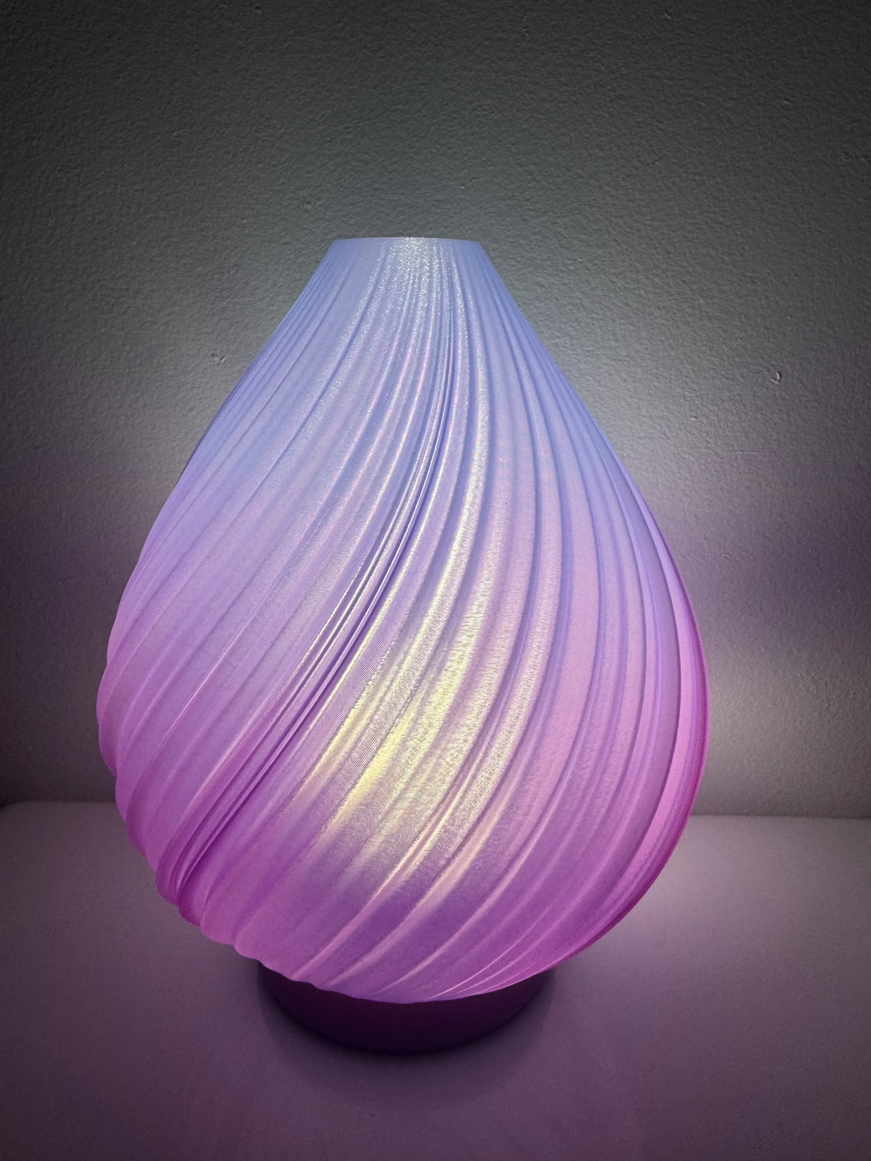 Beautiful print! We have printed two, and notice the lamp shade comes apart where it meets the very bottom layer (on both that we've printed). Not sure if this is user error, or a potential flaw in the file?