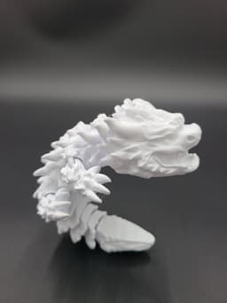 Snowfall, Winter Dragon Child - Articulated Dragon Snap-Flex Fidget (Loose Joints) 3d model