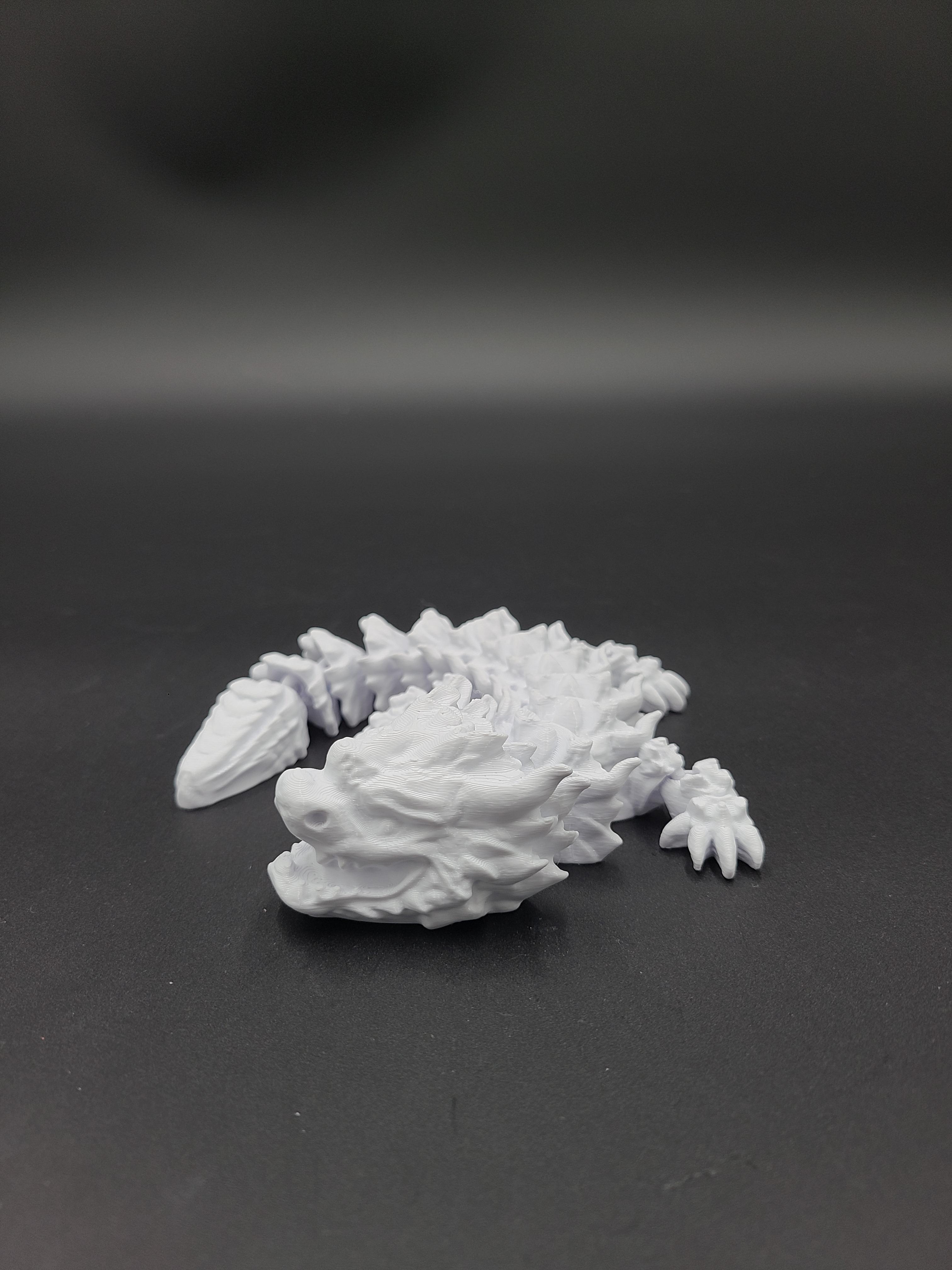 Snowfall, Winter Dragon Child - Articulated Dragon Snap-Flex Fidget (Loose Joints) 3d model