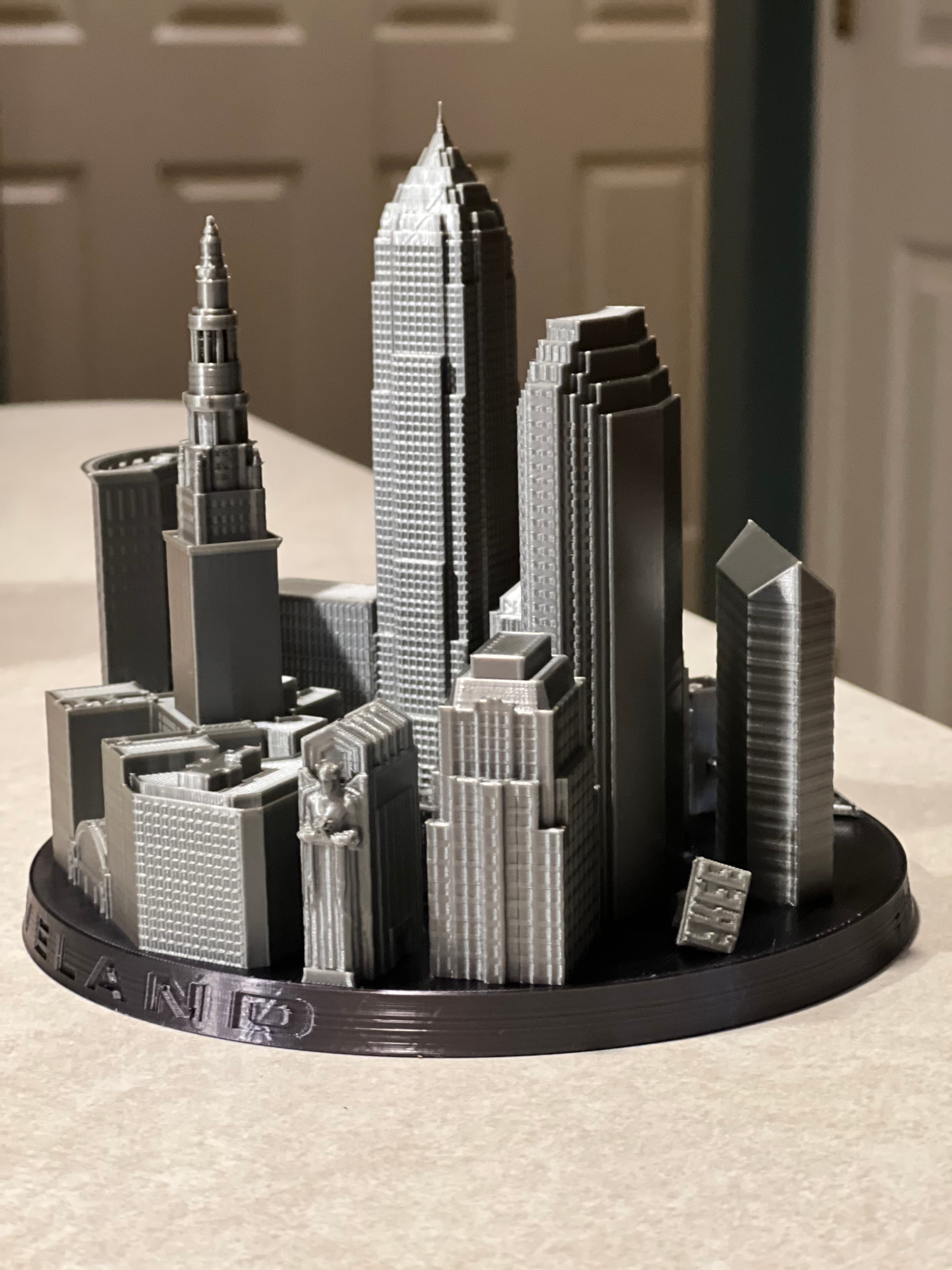 This is Awesome!
I used Black silk for the base and switched out filament to silver silk for the building's.
Printed at 100% scale with 20% infill on a
Ender 3 Neo.