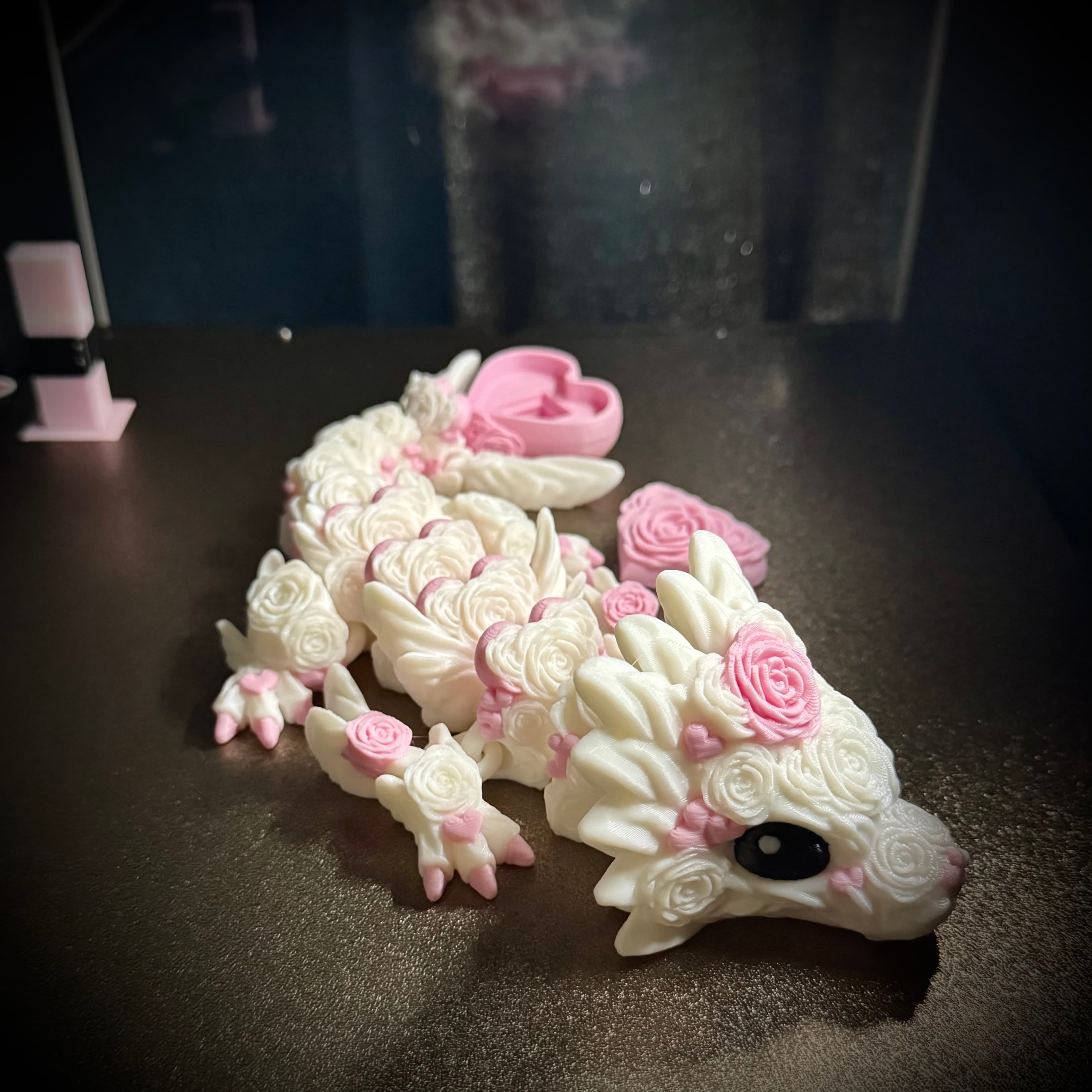 Love this one so so so much! Combination adorable Cinder baby dragon with a clicker tail!! 😍 Also printed the heart clicker keychains!
My main printer isn’t in the drop-down list - the dragon was printed on a Snapmaker U1, and the heart clickers on my Flashforge 5M Pro with a multicolour filament.
Please definitely make more baby dragons with clicker tails - thank you for your awesome designs!!!
