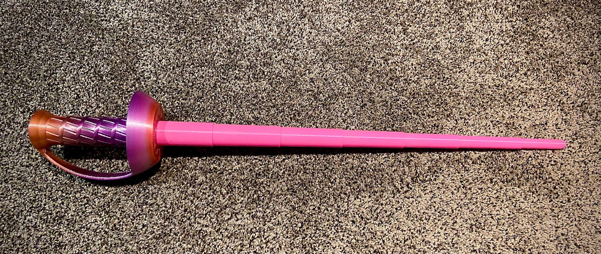 Rainbow Silk (Eryone) for the hilt, Creality Pink for the blade.