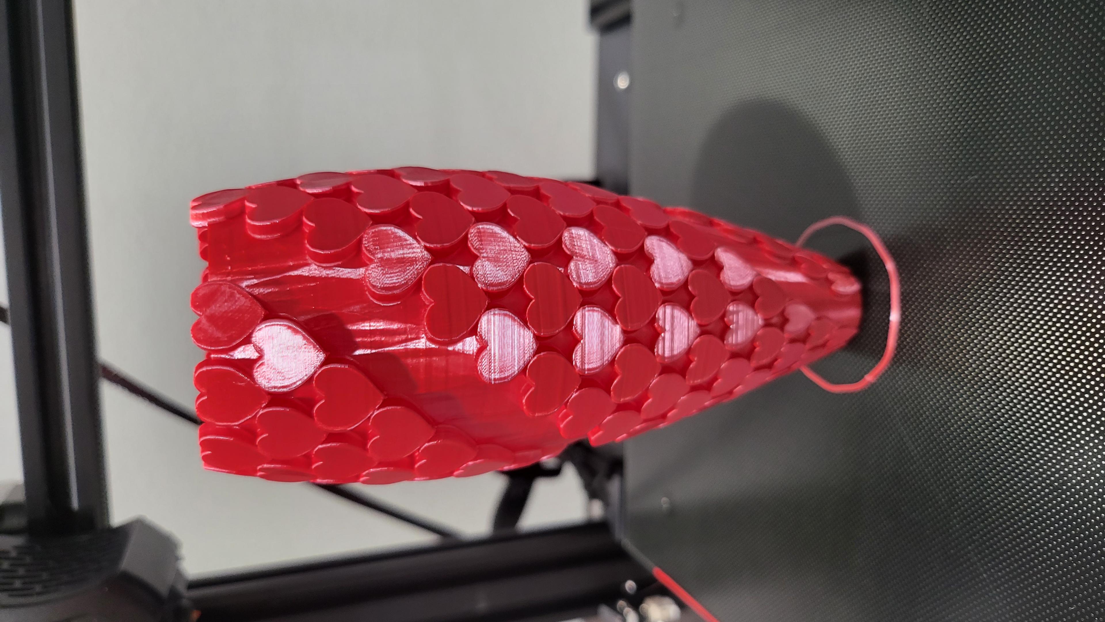 Hearts Vase - Overture silk red pla. Nice easy print. Wish the base was a little bit bigger for added stability but it's not bad. Thanks for sharing the stl. - 3d model