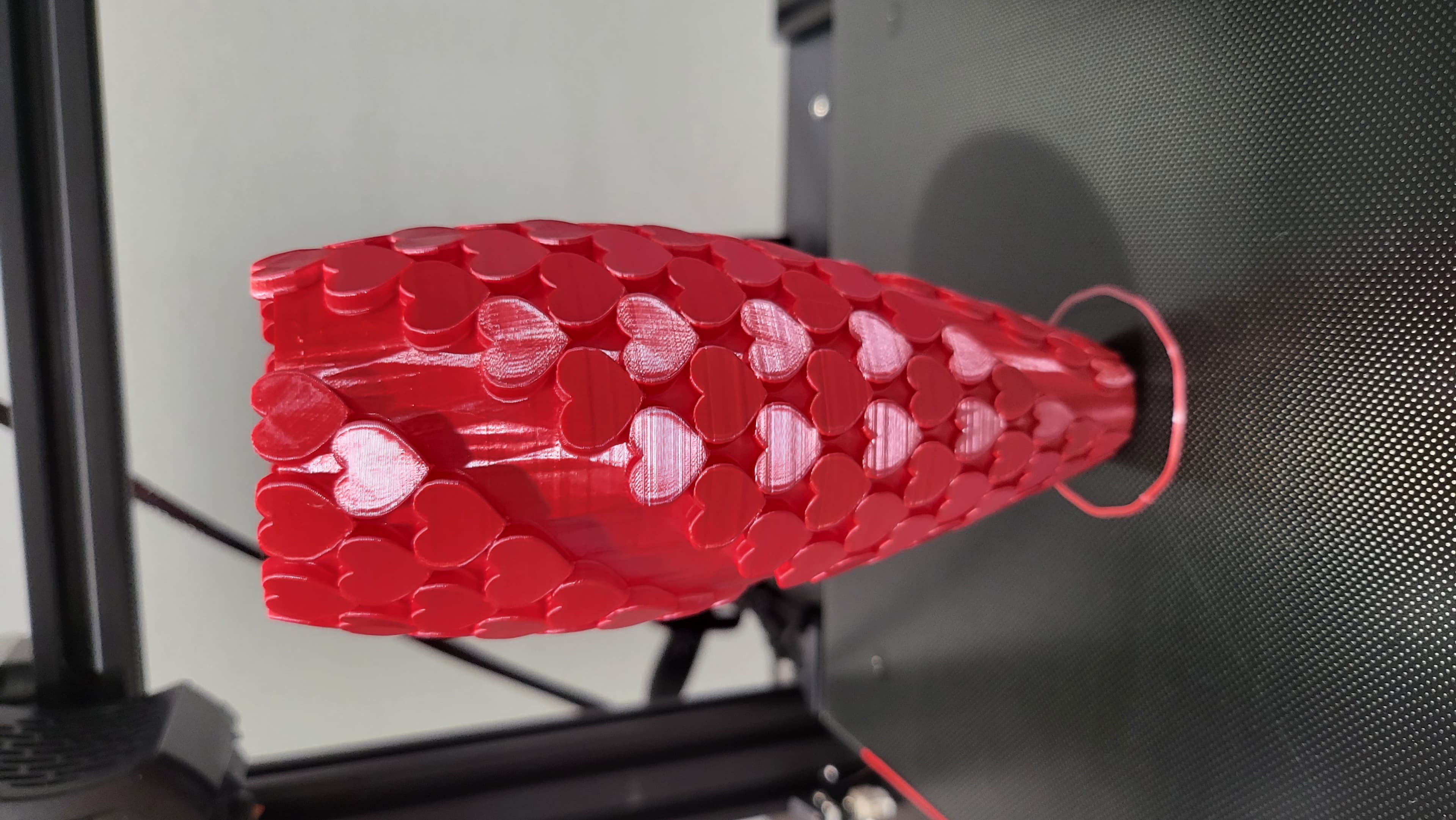 Overture silk red pla. Nice easy print. Wish the base was a little bit bigger for added stability but it's not bad. Thanks for sharing the stl.