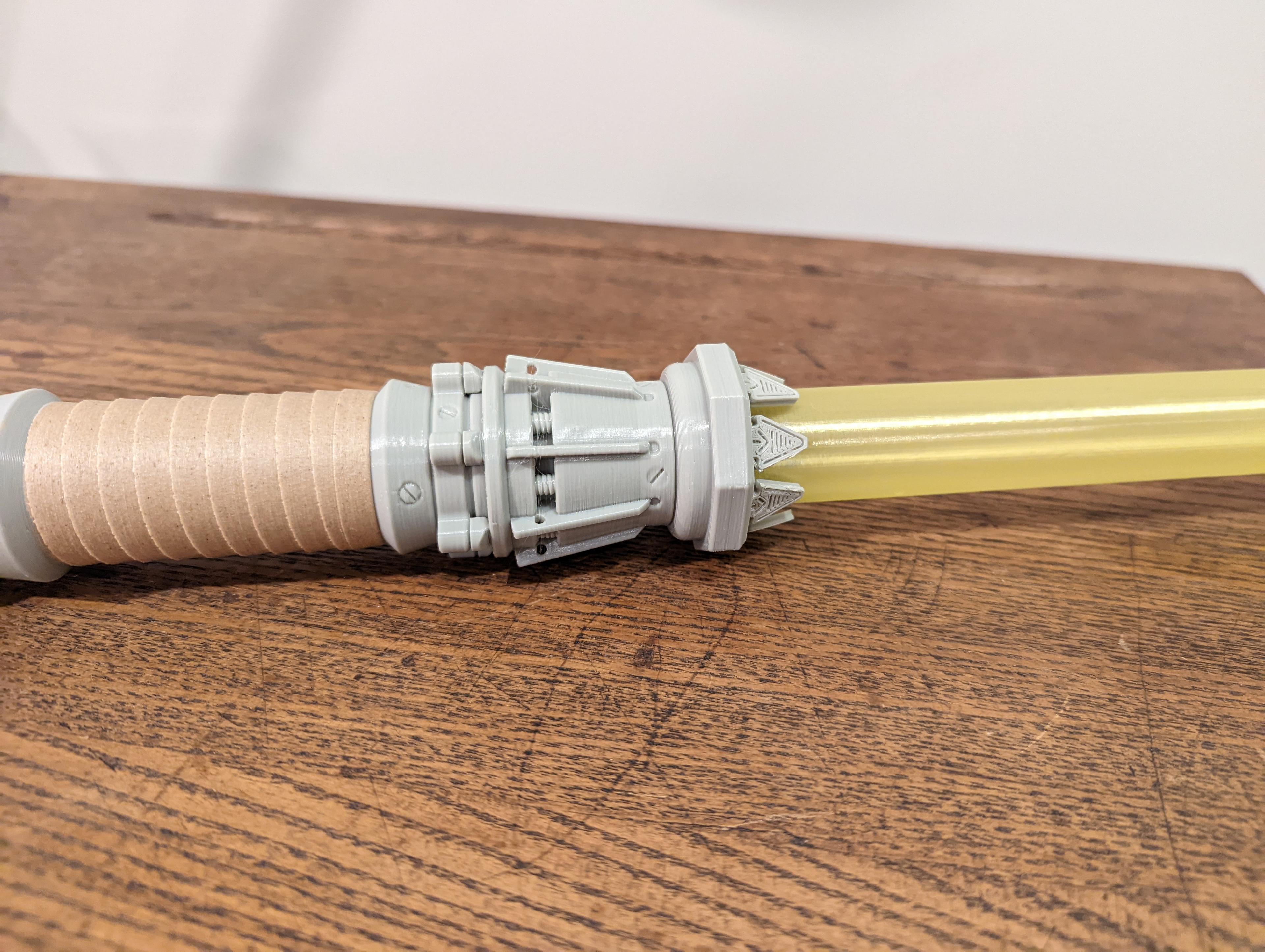 Rey's Collapsing Lightsaber - Sliceworx Storm Grey and Wood PLA
Ziro Translucent Yellow PLA - 3d model