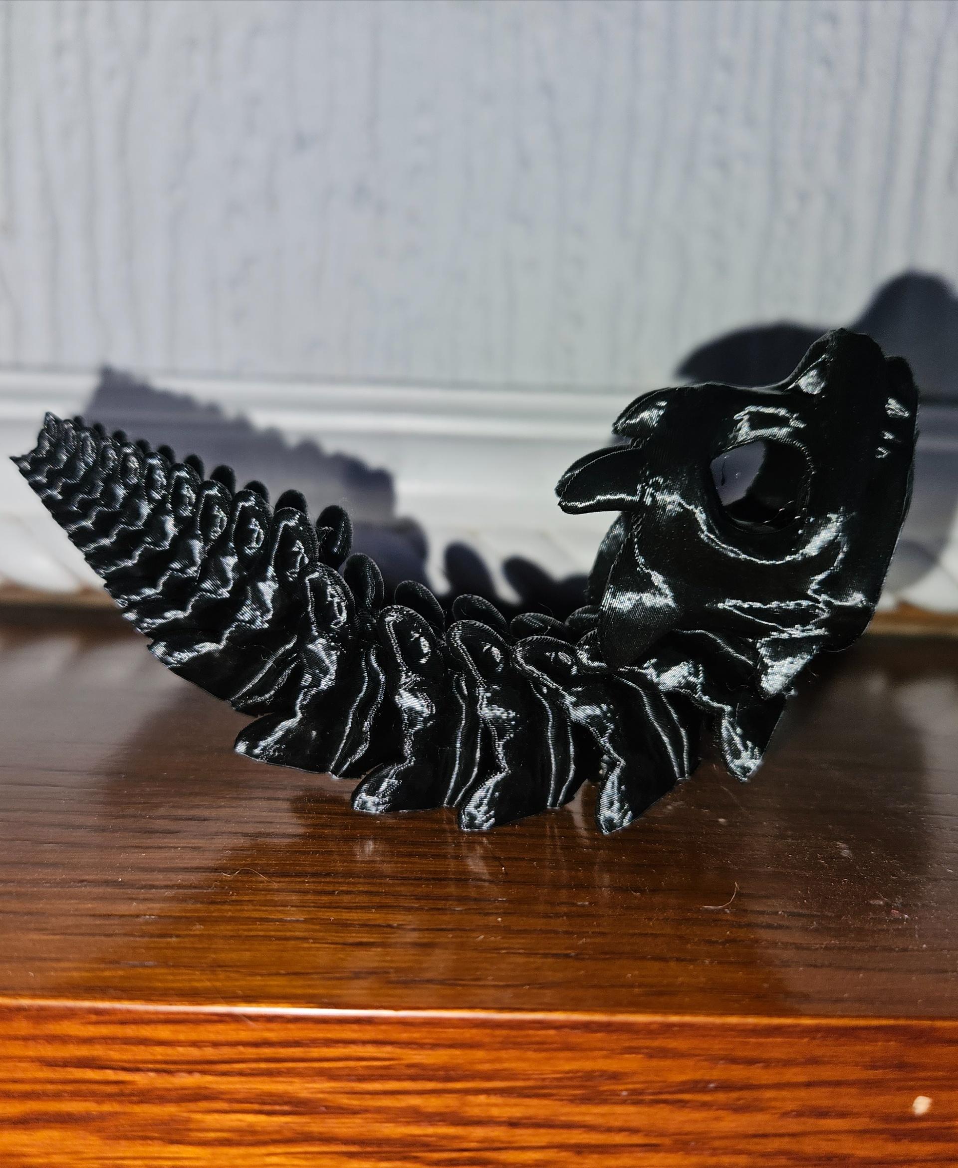 Short Bony Basilisk - Articulated Snap-Flex Fidget (Tight Joints) - This came out so well! Settings as described and 20% infill. Giantarm black PLA bed 60° nozzle 200° on Ender 3 S1 pro. On to the big boi now! - 3d model