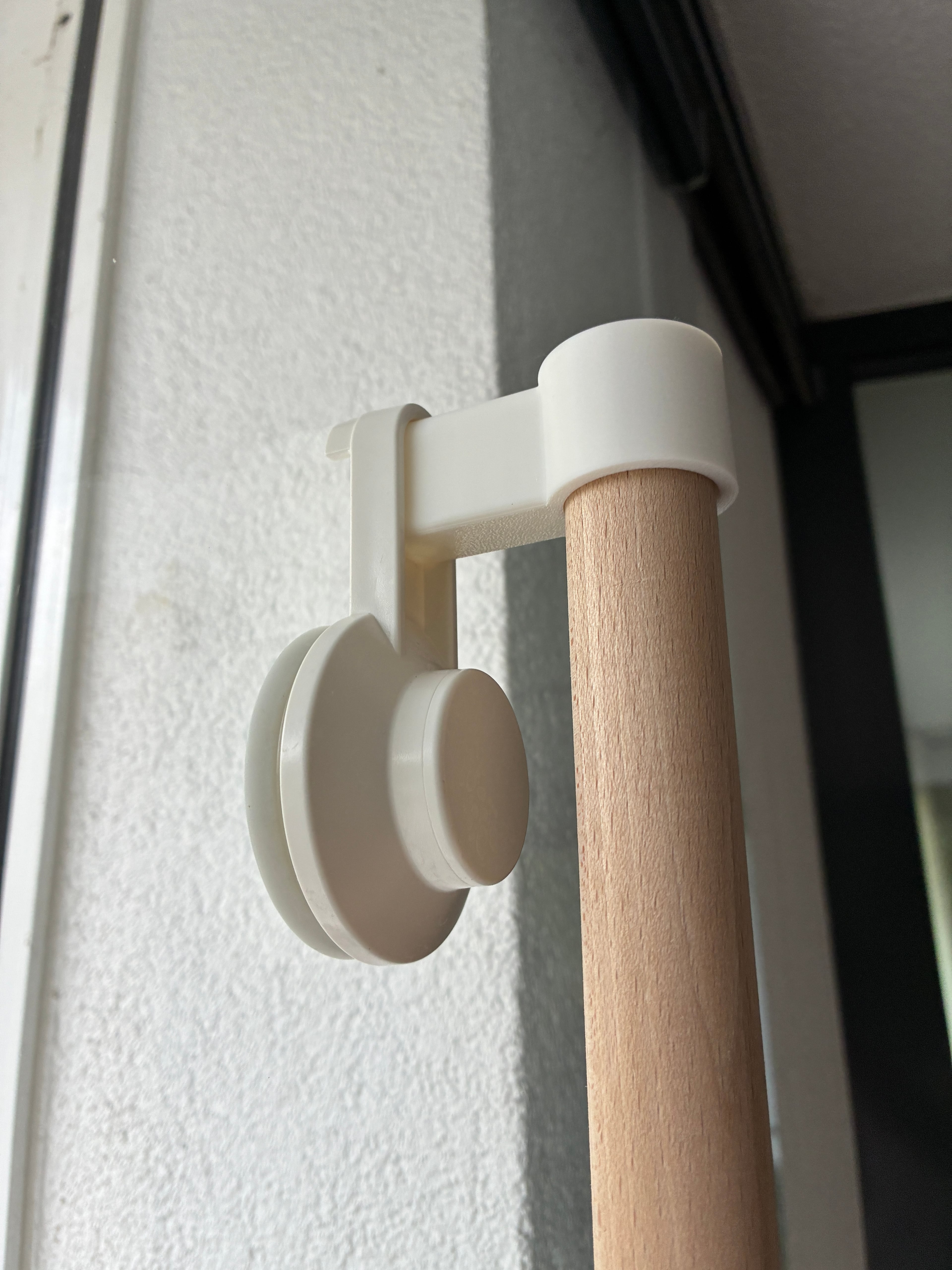 Great project! I added a mount that uses IKEA TISKEN suction cups to adhere directly to the window. Works great!