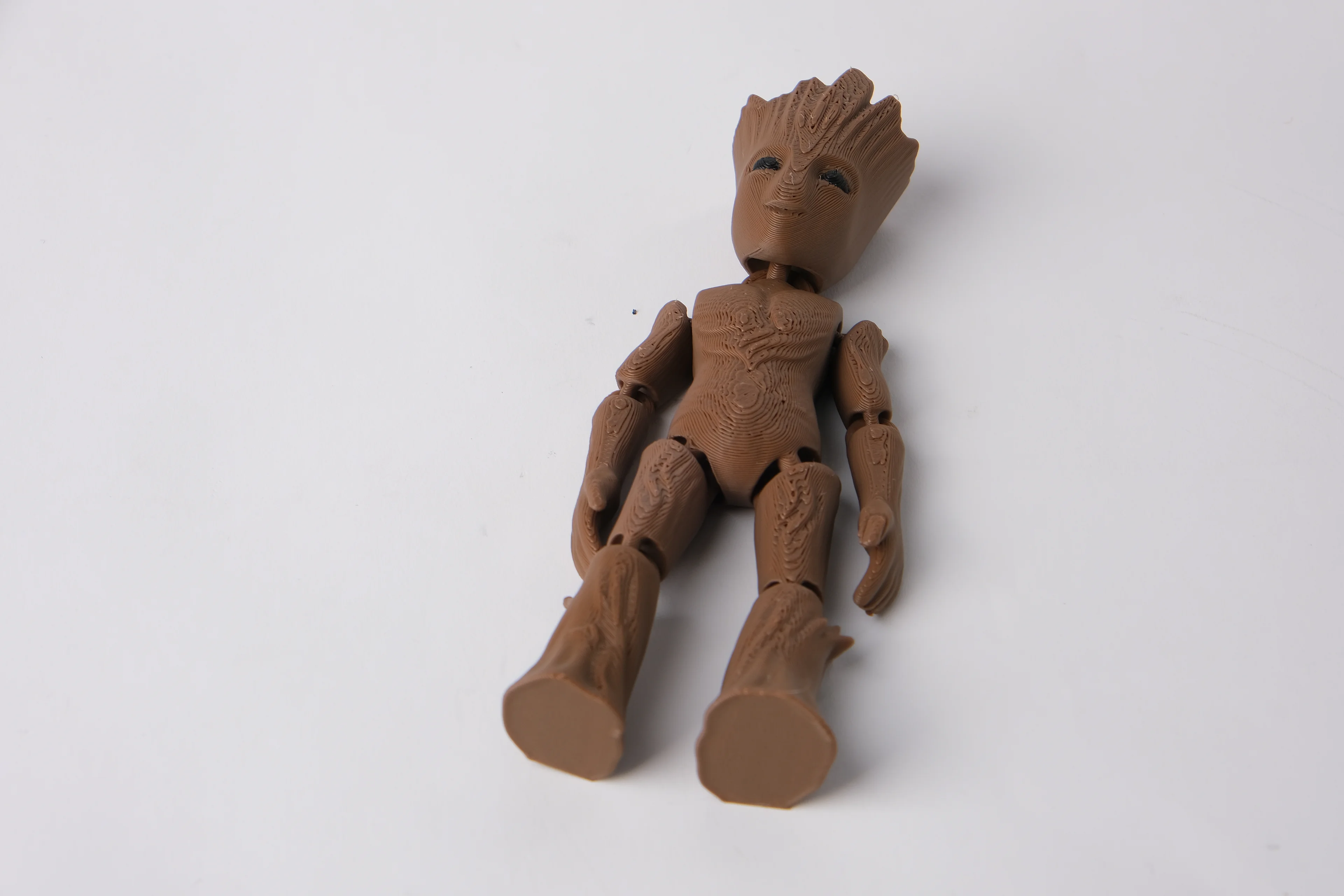 Articulated Groot Action Figure with Wood Texture 3d model