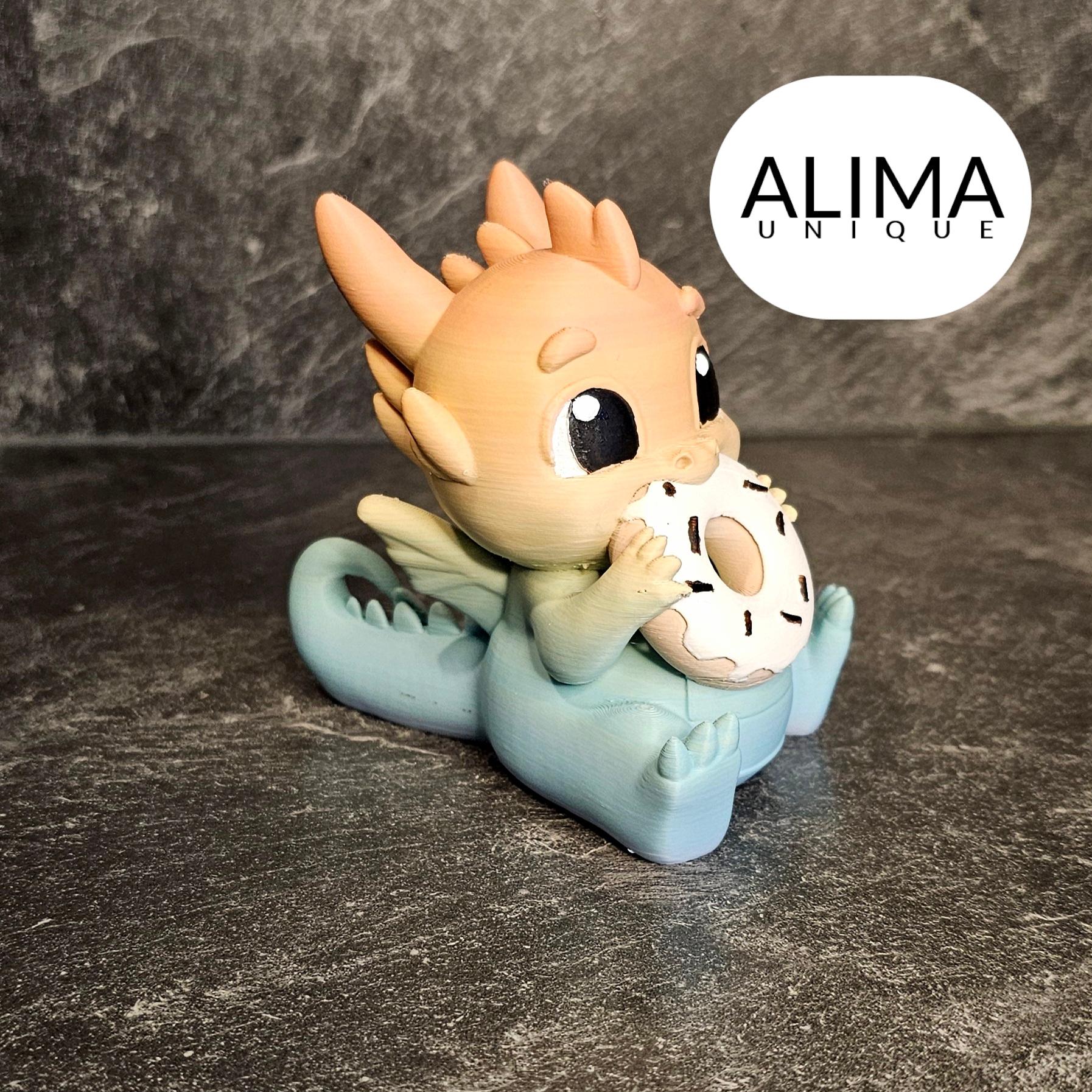 Baby dragon eating a donut 3d model