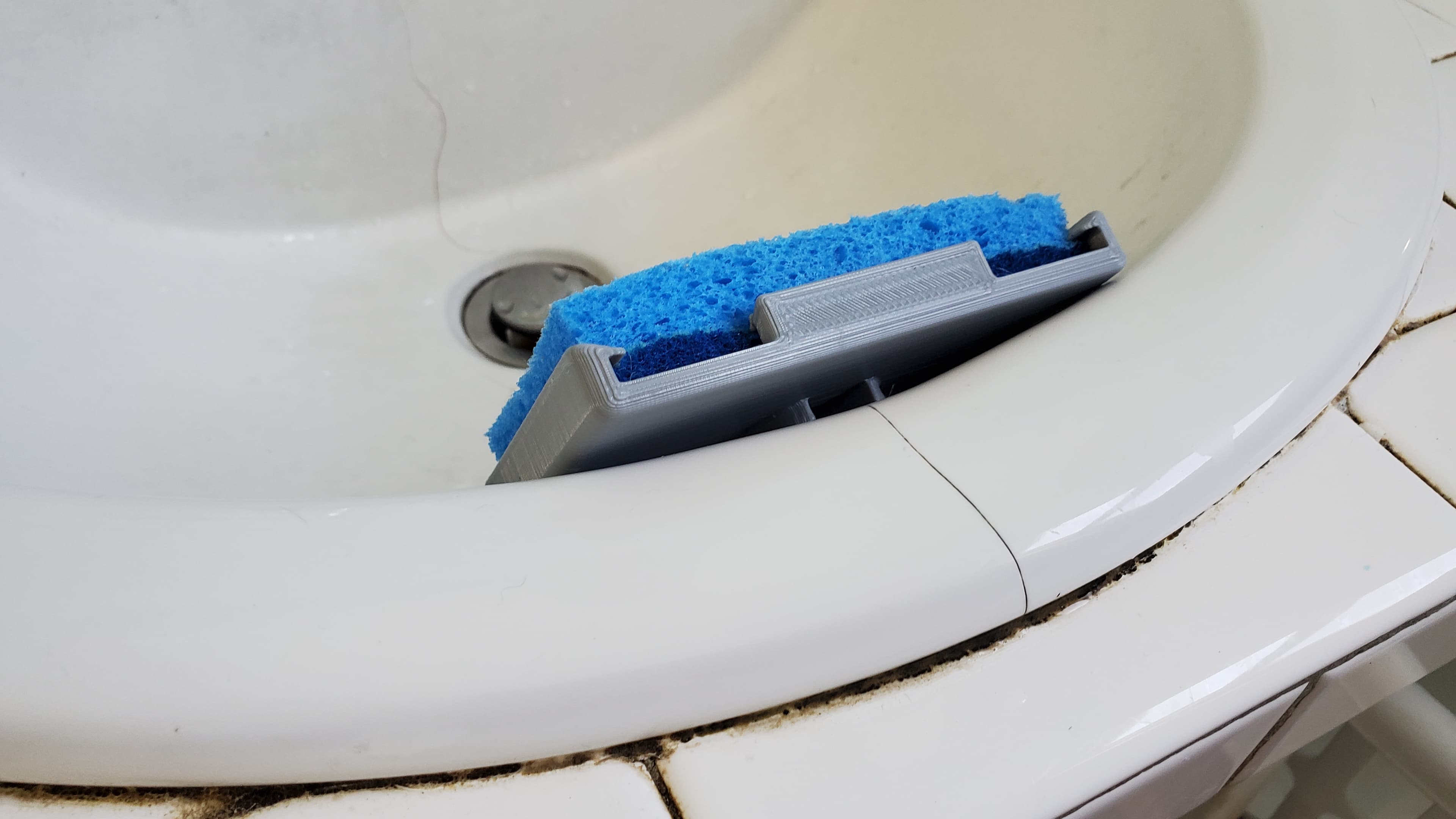 Addaptive sink over flow sponge holder 3d model