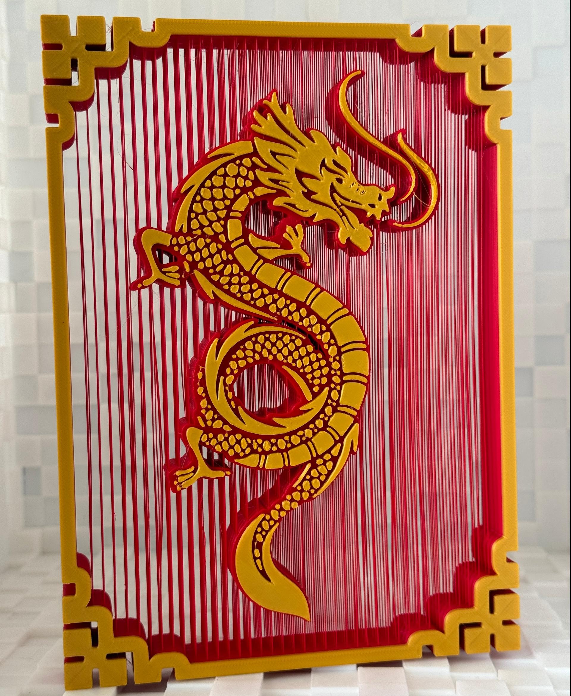 Dragon Suspended String Art - I really love these Suspended String Art models. It always amazes me to see a printer's ability to bridge like this! I printed this one in Polymaker Polylite Wine Red and Gold SIlk PLA; beautiful and amazing.
Thanks to 3dprintbunny for the model. - 3d model