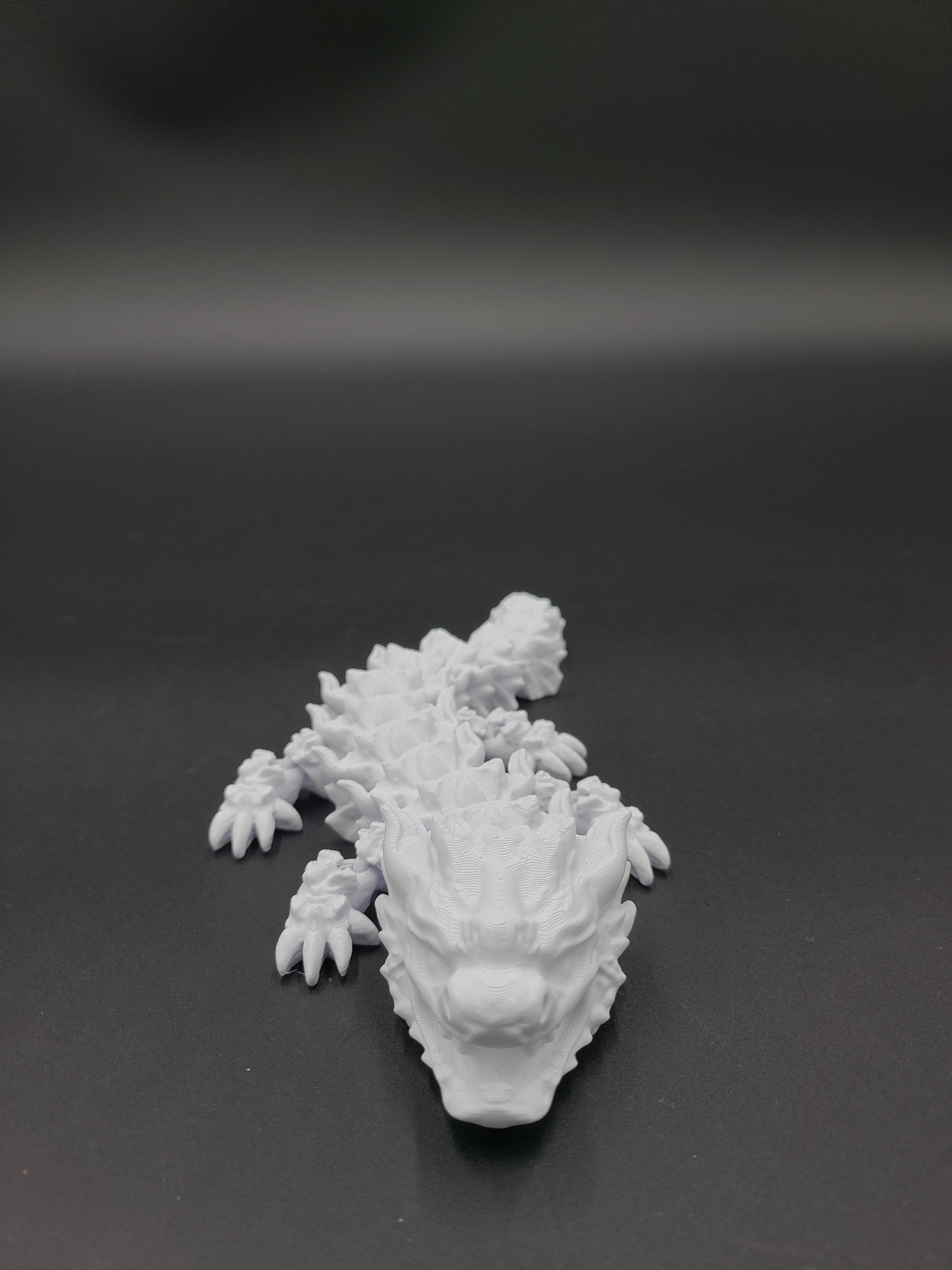 Snowfall, Winter Dragon Child - Articulated Dragon Snap-Flex Fidget (Tight Joints) 3d model