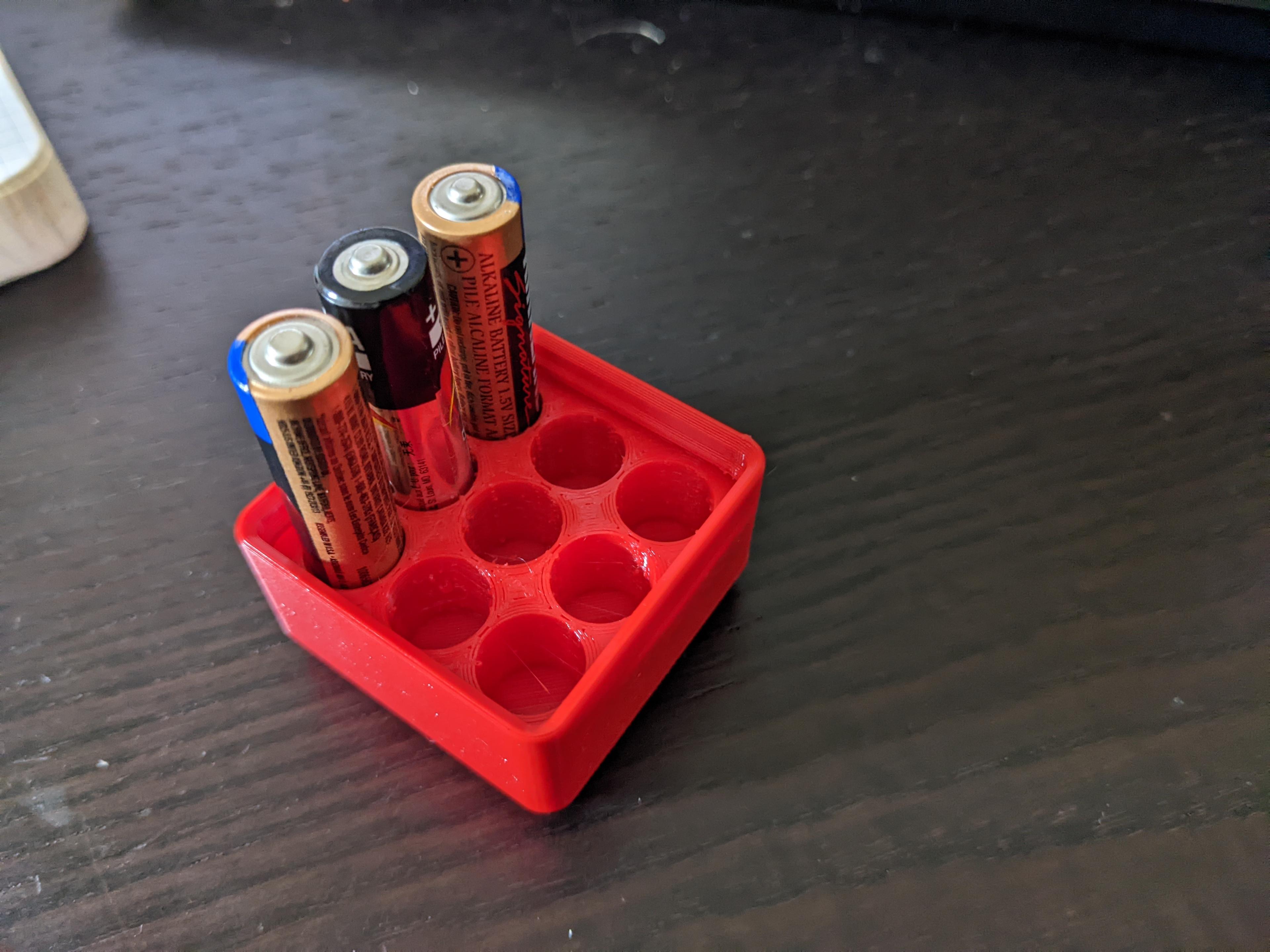 Gridfinity compatible 1x1 9xAAA battery holder.stl 3d model