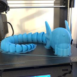 Dratini (Pokemon)- Print-In-Place Flexi - Dratini printed on Prusa Mk3s. .2mm layer height and a .4mm nozzle. Printed in Matterhackers Light Blue PLA.