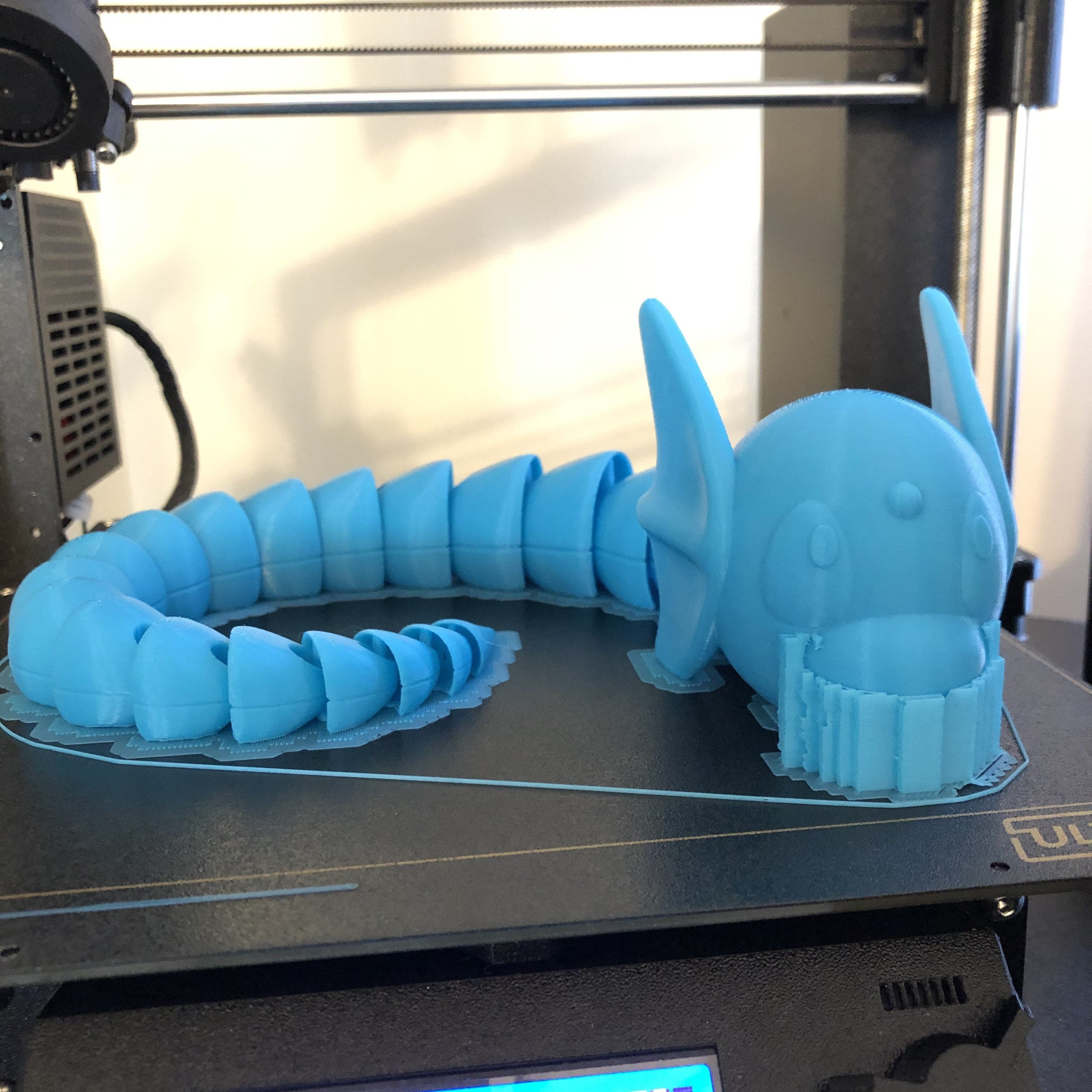 Dratini printed on Prusa Mk3s. .2mm layer height and a .4mm nozzle. Printed in Matterhackers Light Blue PLA.