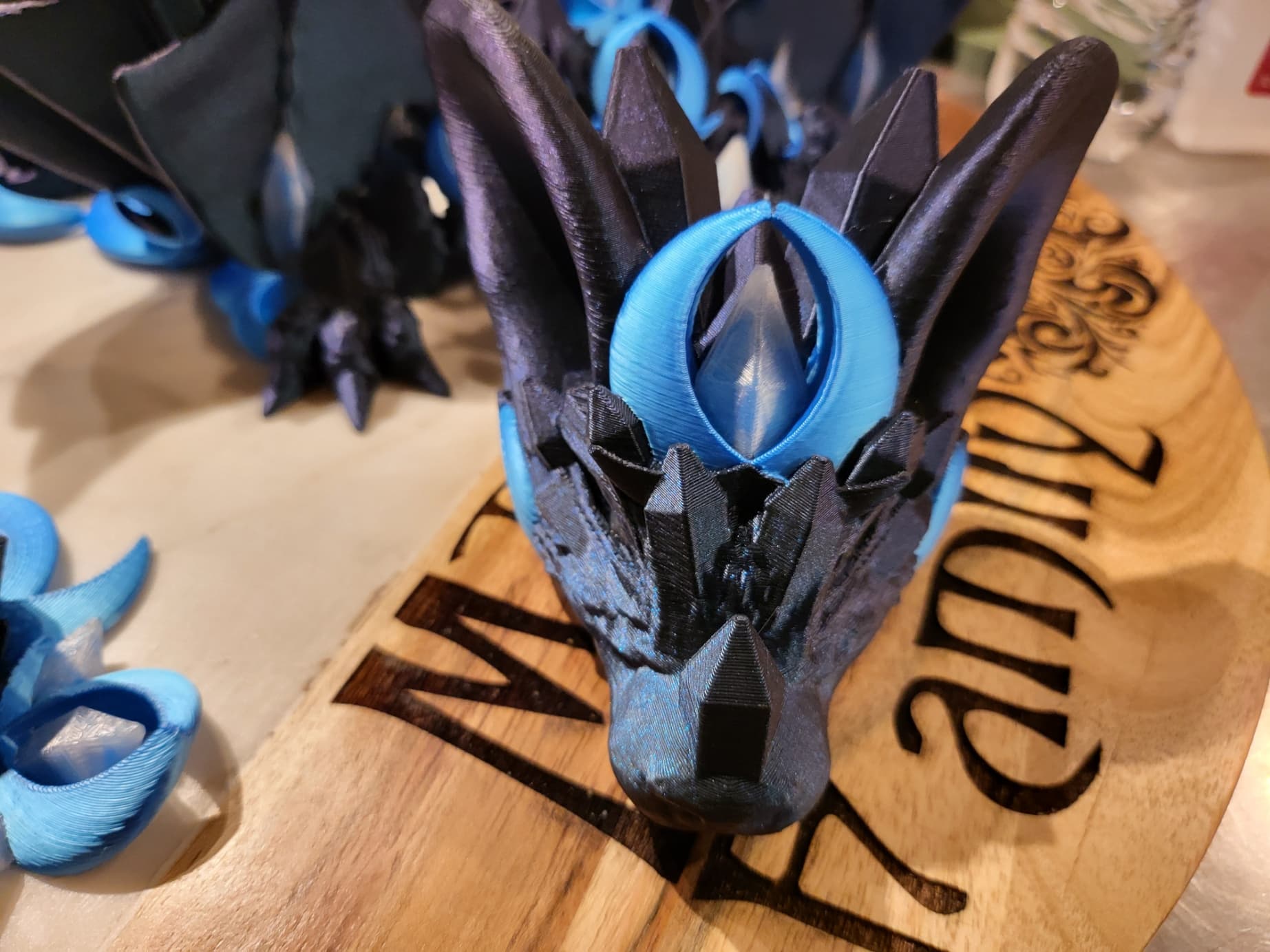 175% Print, really wish the coloring was better. The head piece doesn't even have the tails set to the right color. Most of the "gems" are body color which looks a bit weird. Overall content with the print, but it could have been so much better. Working on correcting the color issues and reprinting a smaller version. A 711g print resulted in 815g of waste using a relatively small prime tower and .5 multiplier on the flush with purge to infill. Correcting the color would add minimal additional waste as only a the last bit at the top doesn't go through color changes. A multi-headed printer would be ideal.
Filament:
PLA: Burnt Titanium, Translucent, Silk Blue