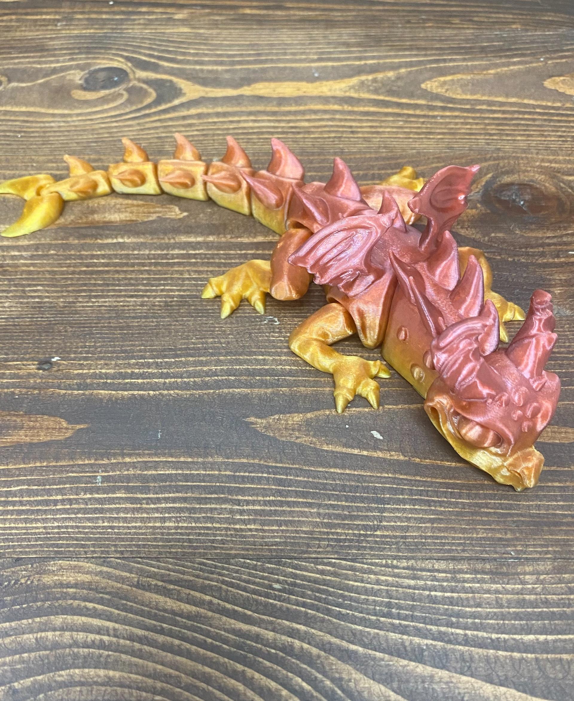 Articulated Cute Dragon - A cute little Lava Dragon. Printed with rainbow transculent PETG on a Bambu Labs X1-Carbon. - 3d model