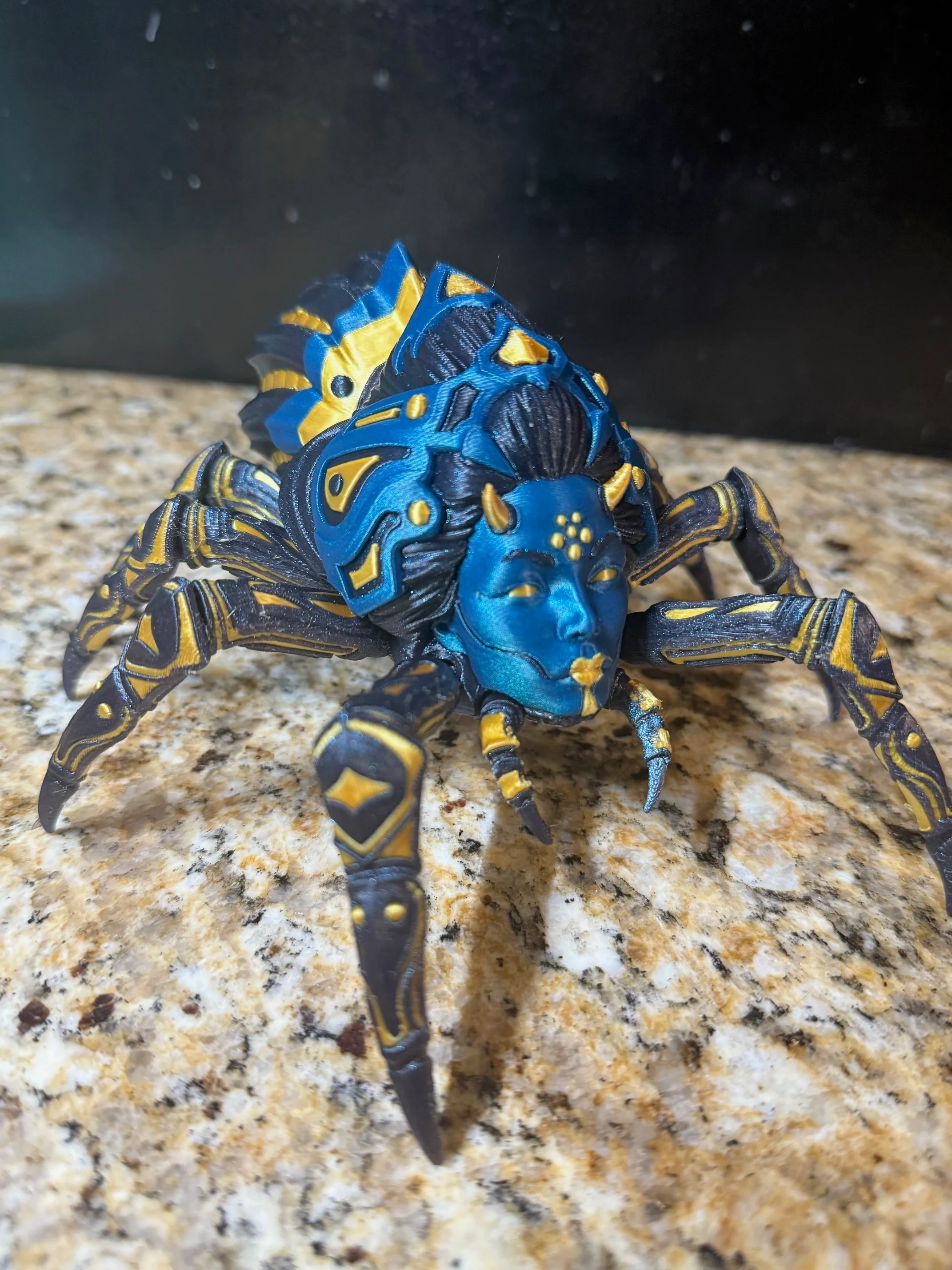 Ridiculously cool spider lady! Already printing out a bigger one. :)
PLA used:
Dark blue/black: ELEGOO Galaxy Black
Light blue: Polymaker Panchroma Starlight Neptune
Gold: Geeetech Silk Gold