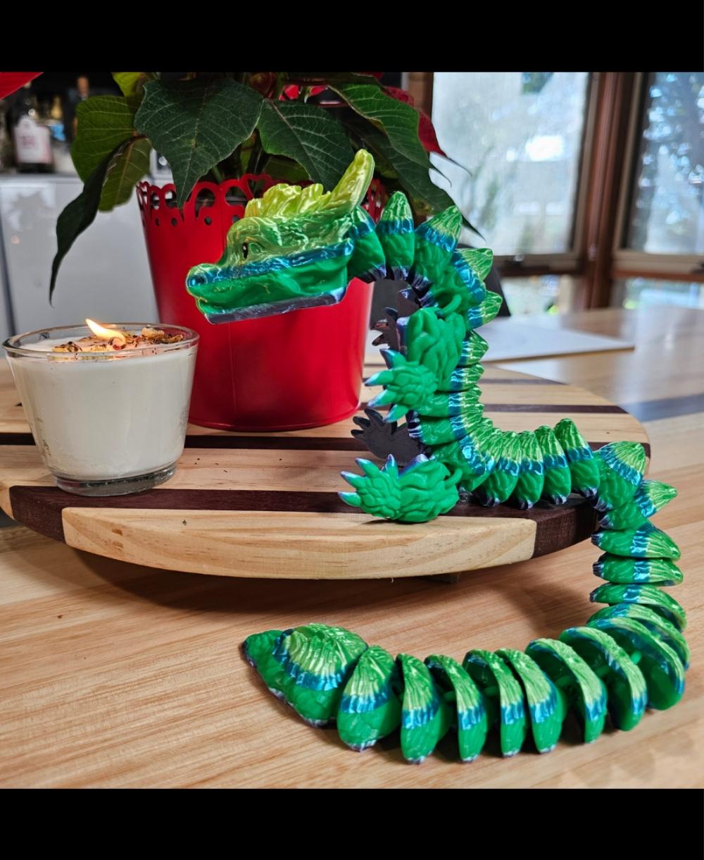 Chip, Wood Dragon - Articulated Dragon Snap-Flex Fidget (Medium Tightness Joints) - Dragon shown with Silk Rainbow Forest with Bambu Green PLA used for the mid section where the Snap-Flex joints need a bit more strength than Silk. - 3d model