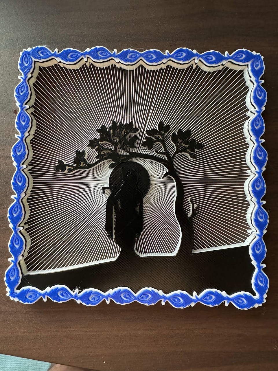 Hi, thanks for the model and just what I was looking for. The 3mf has black color for the circle behind Krishna as opposed to white color, any tips on how to change it?