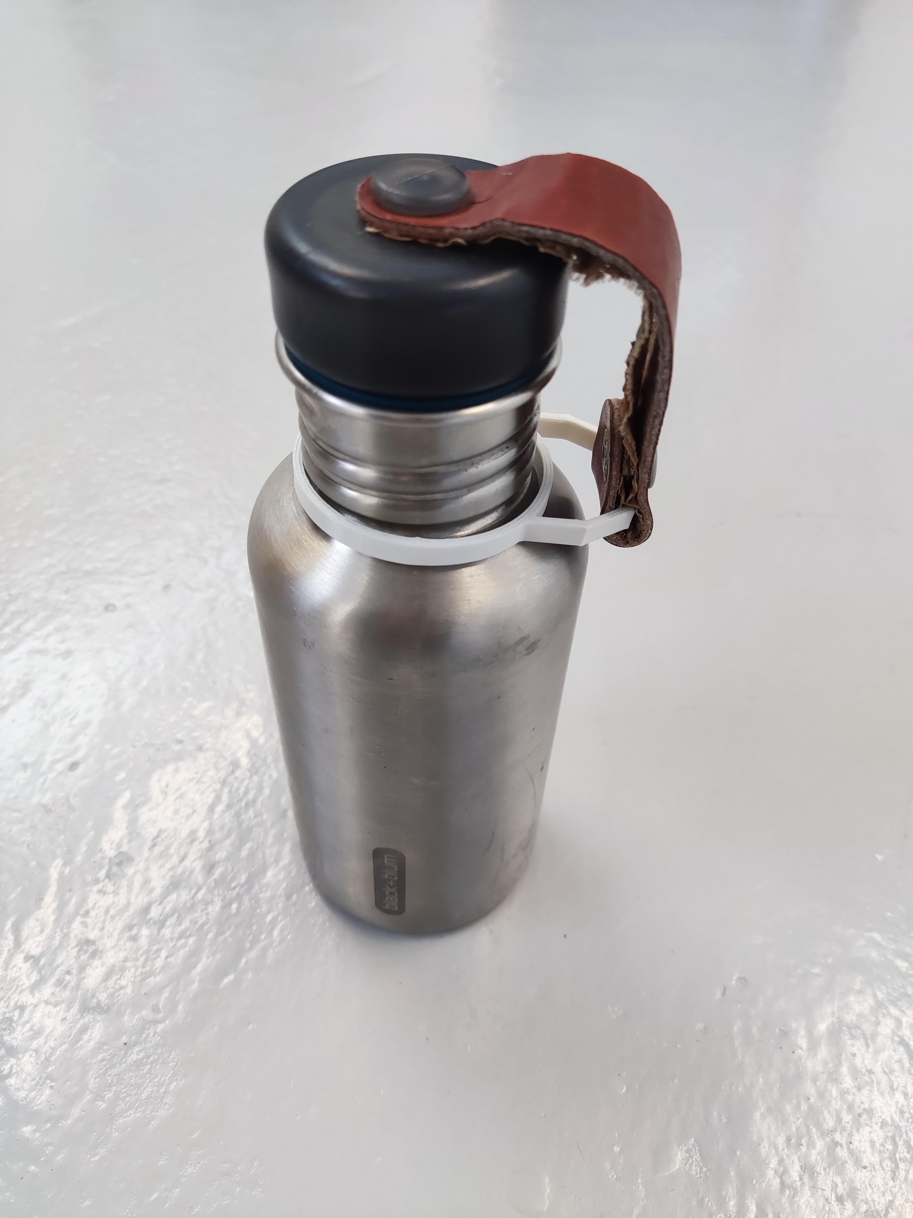 Bottle cap/lid strap holder 3d model