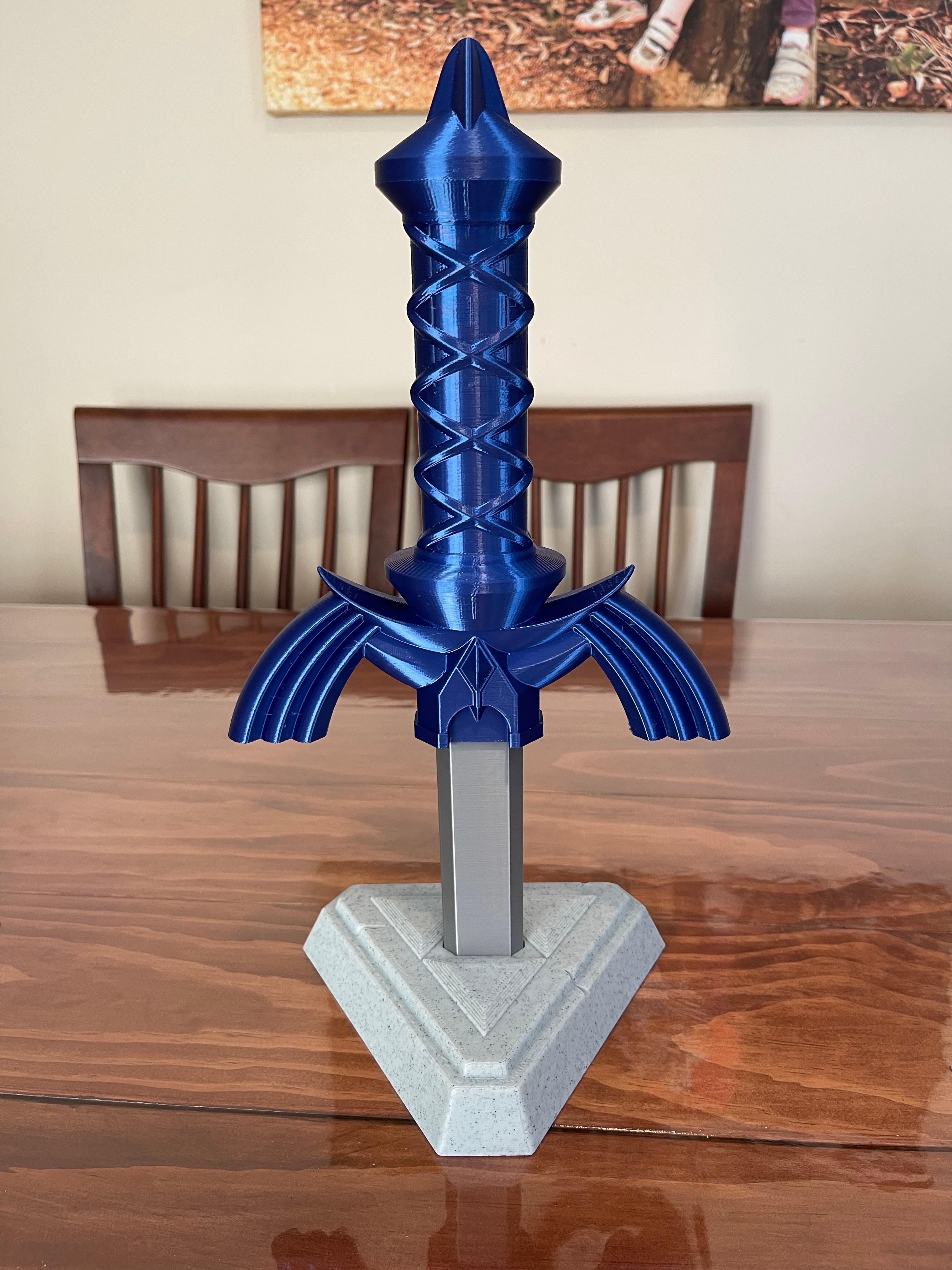 Collapsing Master Sword with Replaceable Blade - As soon as I finished assembling the sword, I just knew the perfect way to display it! Hopped on Tinkercad and knocked up a BOTW-inspired pedestal from a few other files. - 3d model