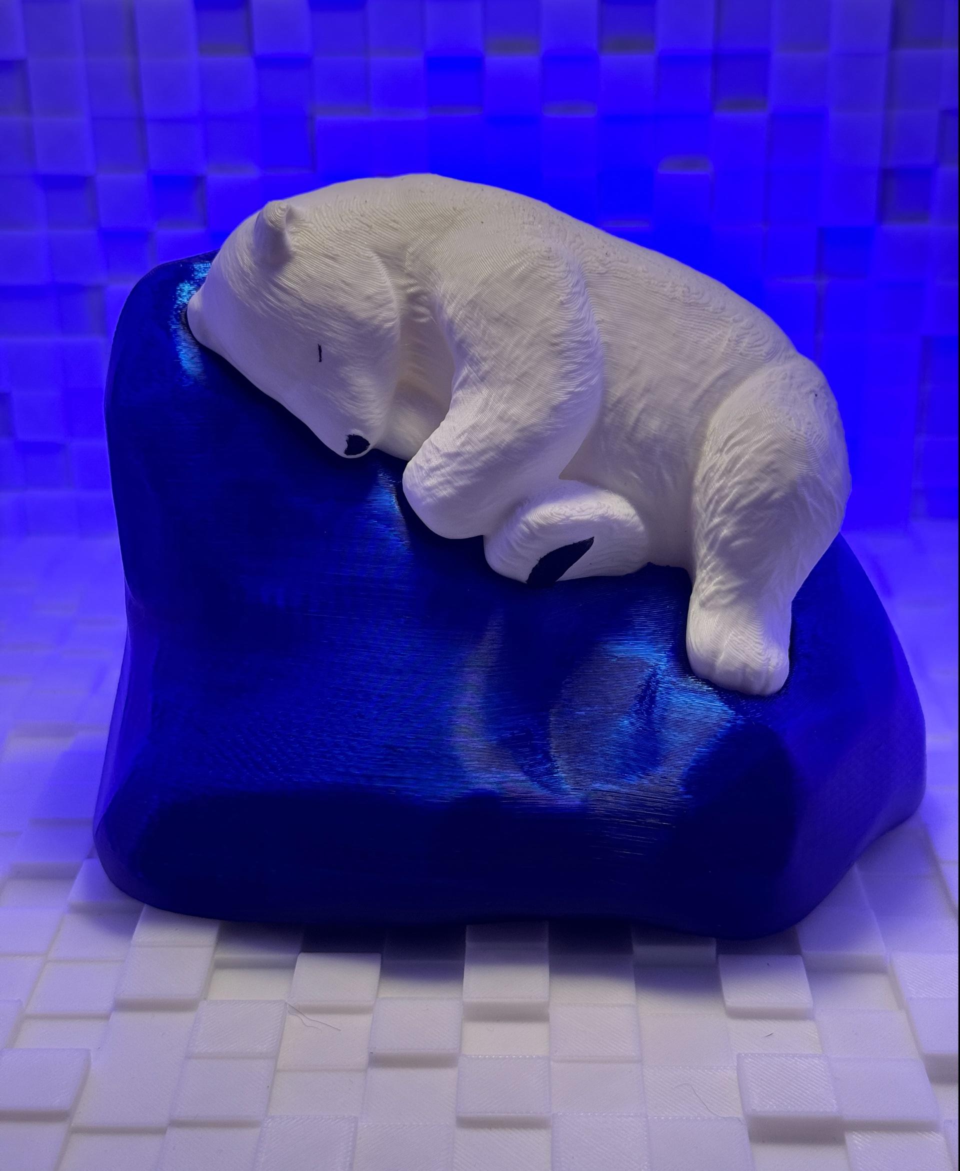 undefined - The iceberg was printed in Polymaker Translucent Blue PETG, the bear in Polymaker Polylite White PLA, and I hand-painted the pad on the foot, the nose, and the eye slit with black acrylic paint.

Such a cute model! - 3d model