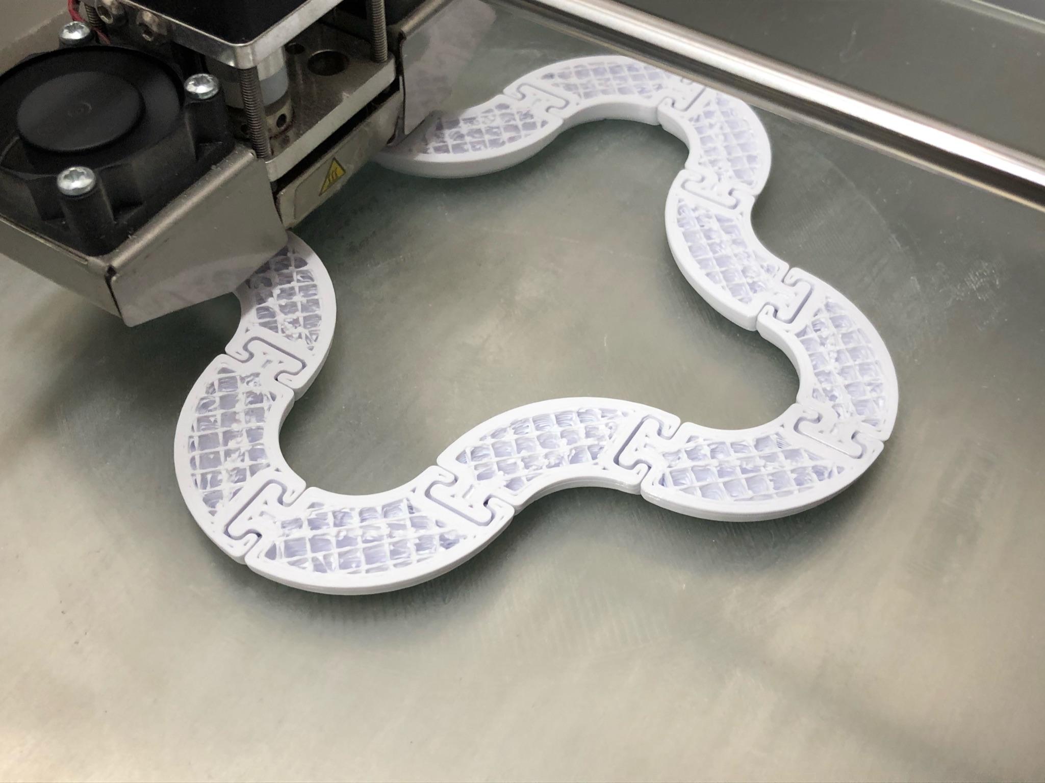 Twisty Tubes - Mid-print picture showing print-in-place design - 3d model