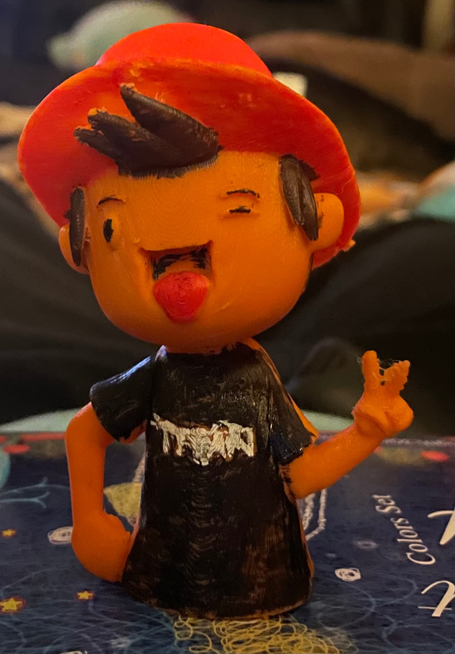Mini Titan with Fedora in Red with a green band. Printed with Zyltech Pumpkin Spice on the Fokoos Odin 5.