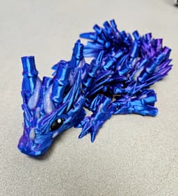 I like to use 5mm brim, 5% lightning infill, and 3 walls. I know it might be overkill, but the brim makes me feel better about adhesion. I LOVE all these dragons and I can't wait to print more. :-D 3d model