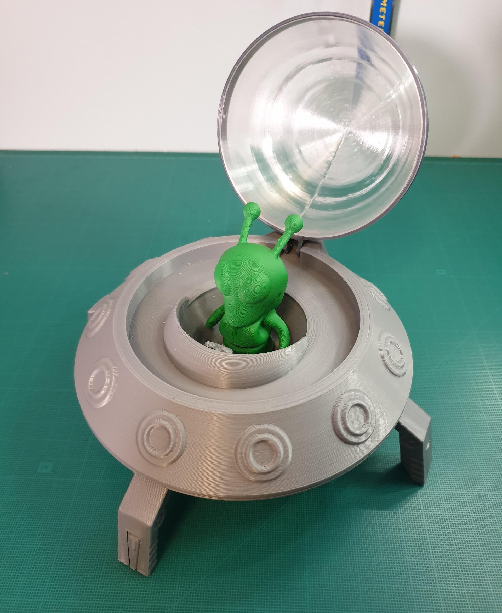 Mr. Big Head with the flying saucer I made for him!