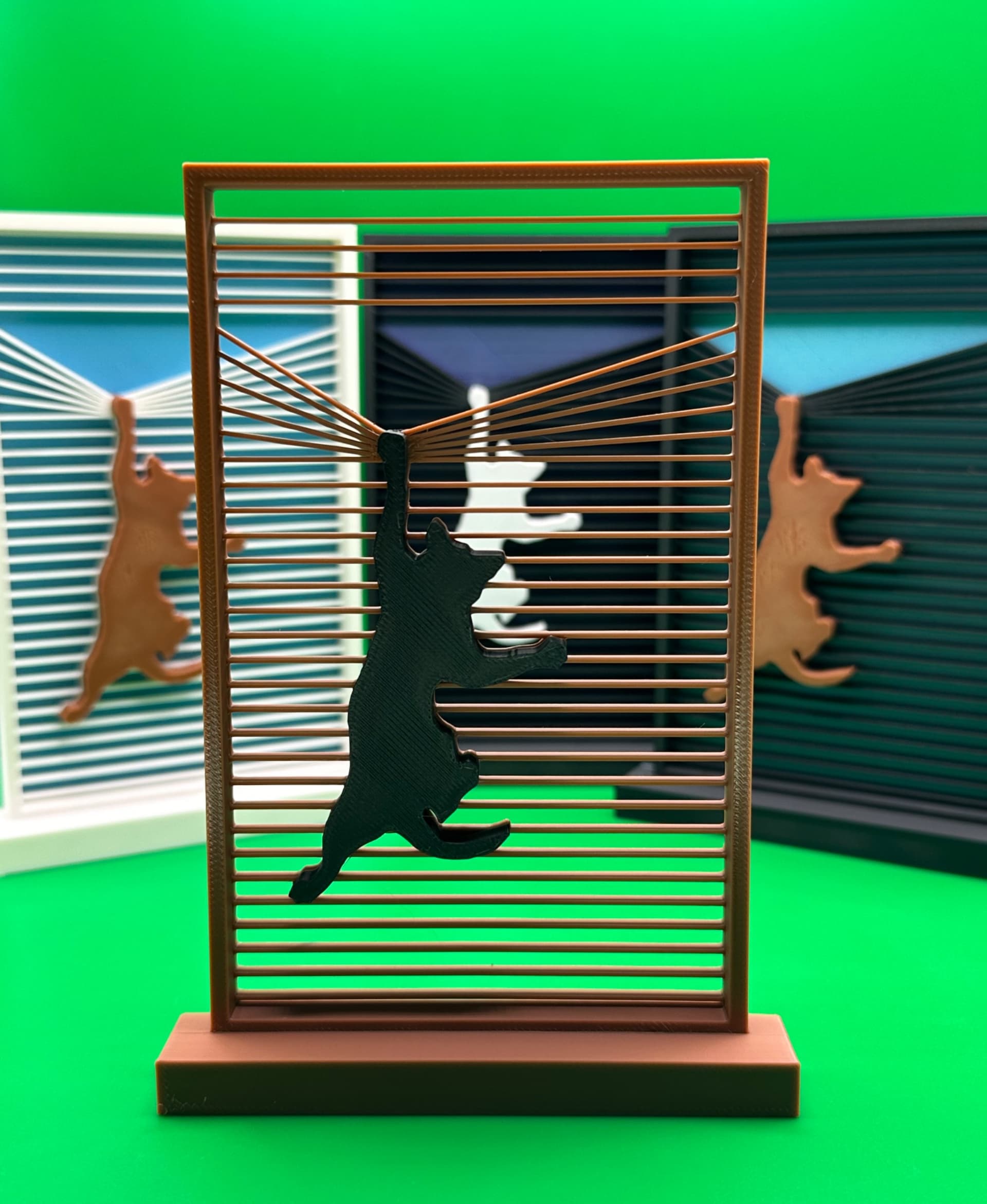 I love this model. The “See-Through” brown frame/black cat is my personal modification. I cut off the back in Bambu Studio where I also painted the model using the height and fill tools. Printed on the X1C with Bambu PLA filaments.