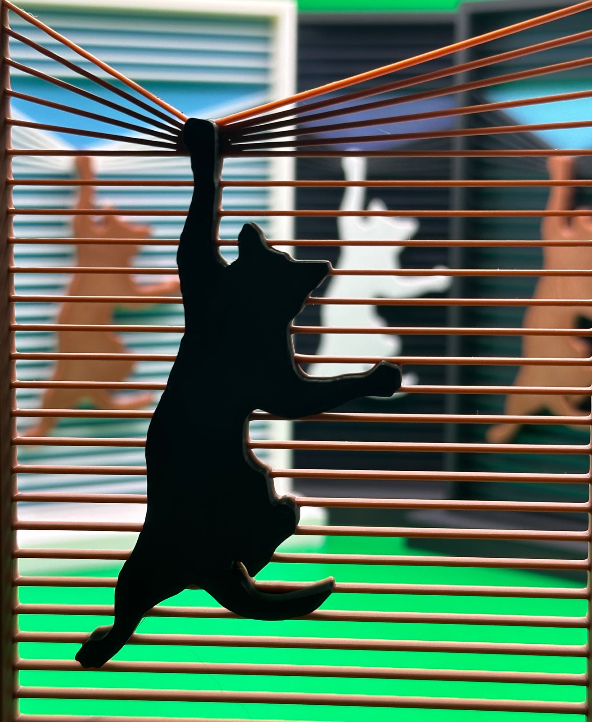 I love this model. The “See-Through” brown frame/black cat is my personal modification. I cut off the back in Bambu Studio where I also painted the model using the height and fill tools. Printed on the X1C with Bambu PLA filaments.