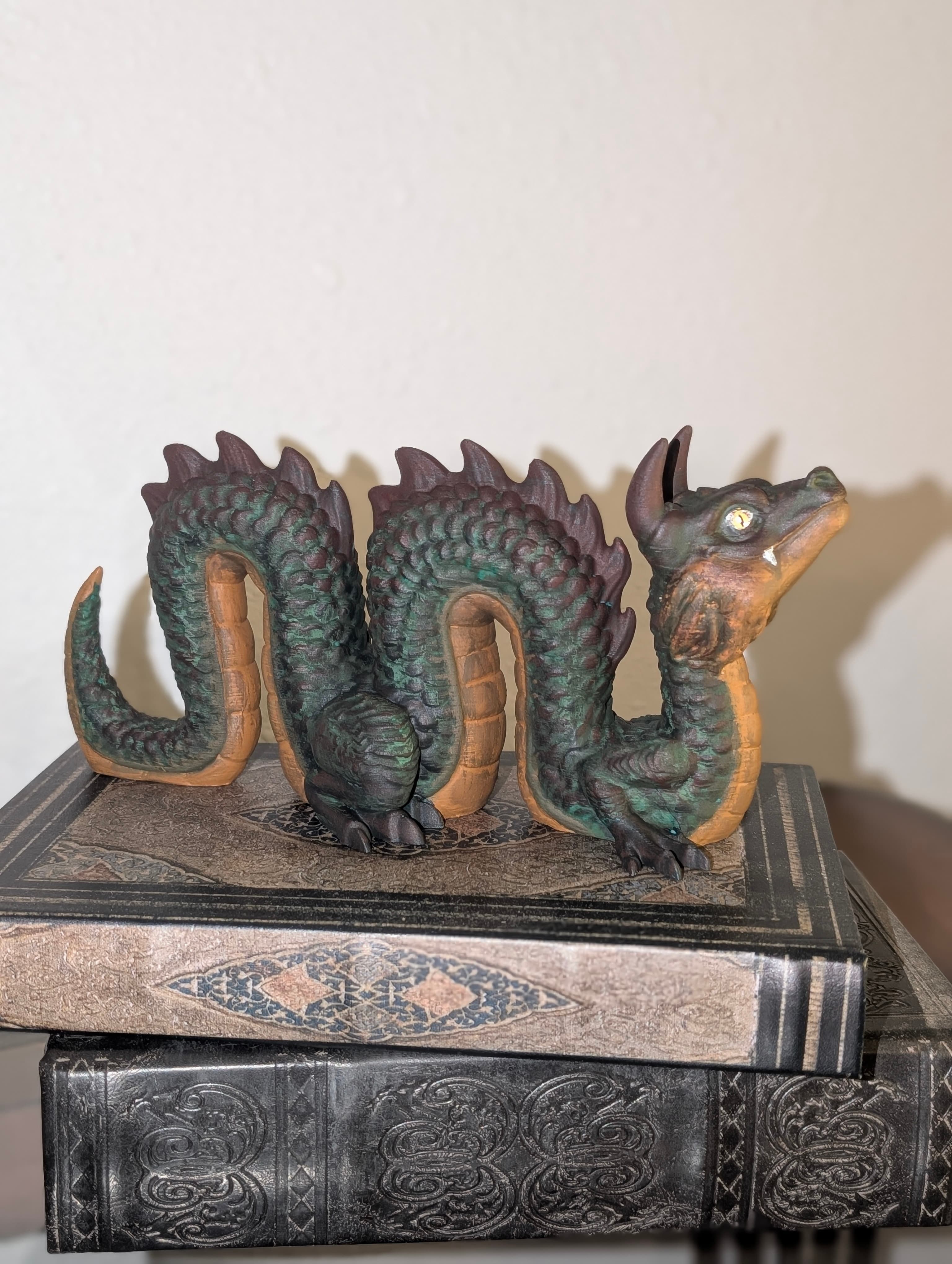 We finally got around to painting the dragon. Great easy print, Granddaughter got artistic license with colors.
