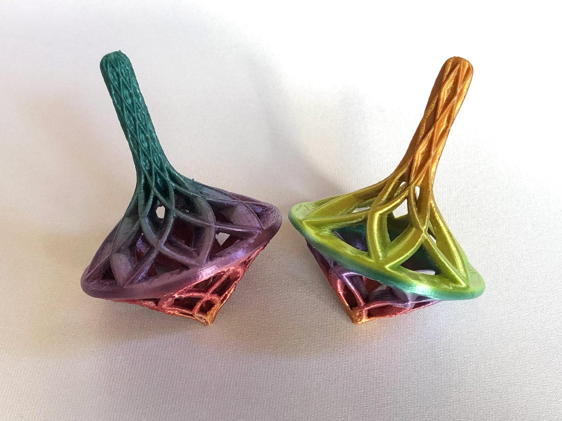 Set of 3 Spinning Tops - 8-point top on the left printed 5 at once (left), and 6-point top printed 9 at once (right), both using TTYT3D quick color change PLA. - 3d model
