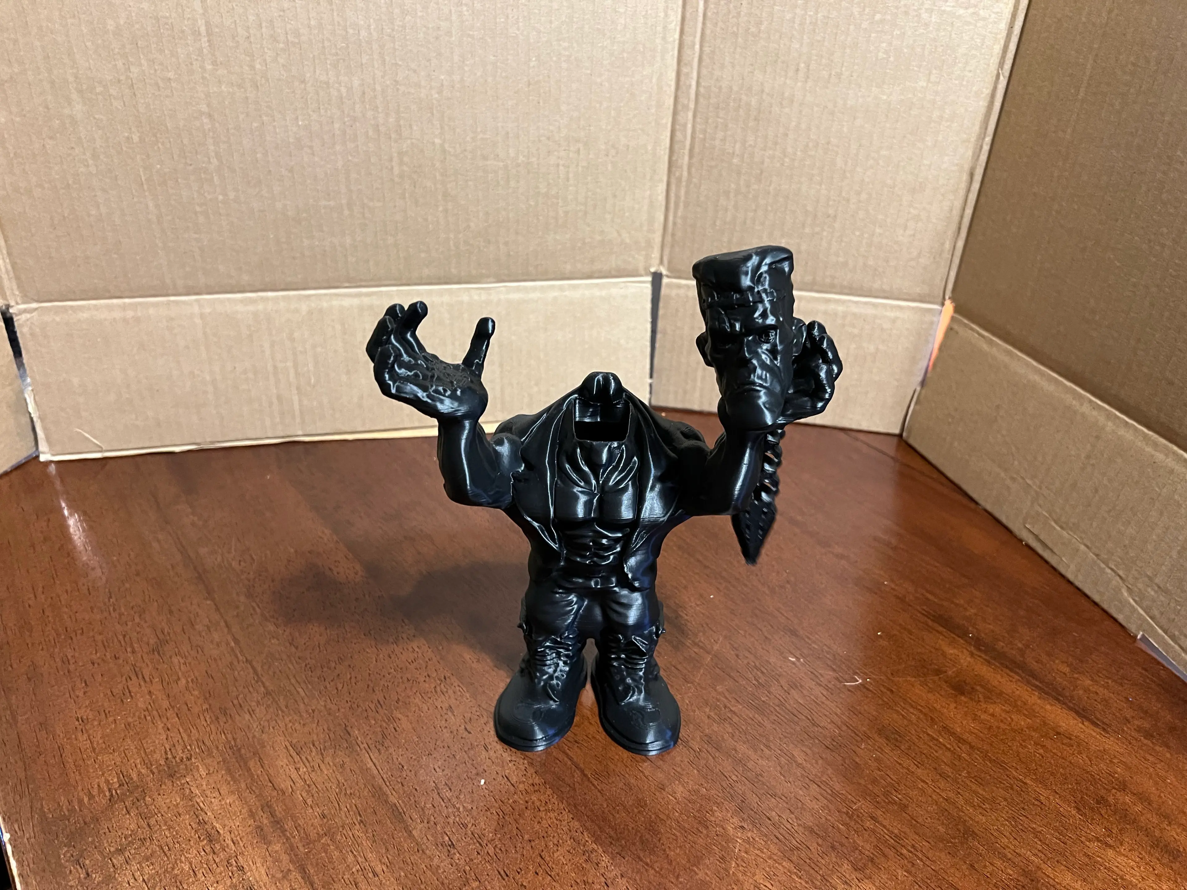 Body was printed with tree supports and brim, but the head/spine was not.