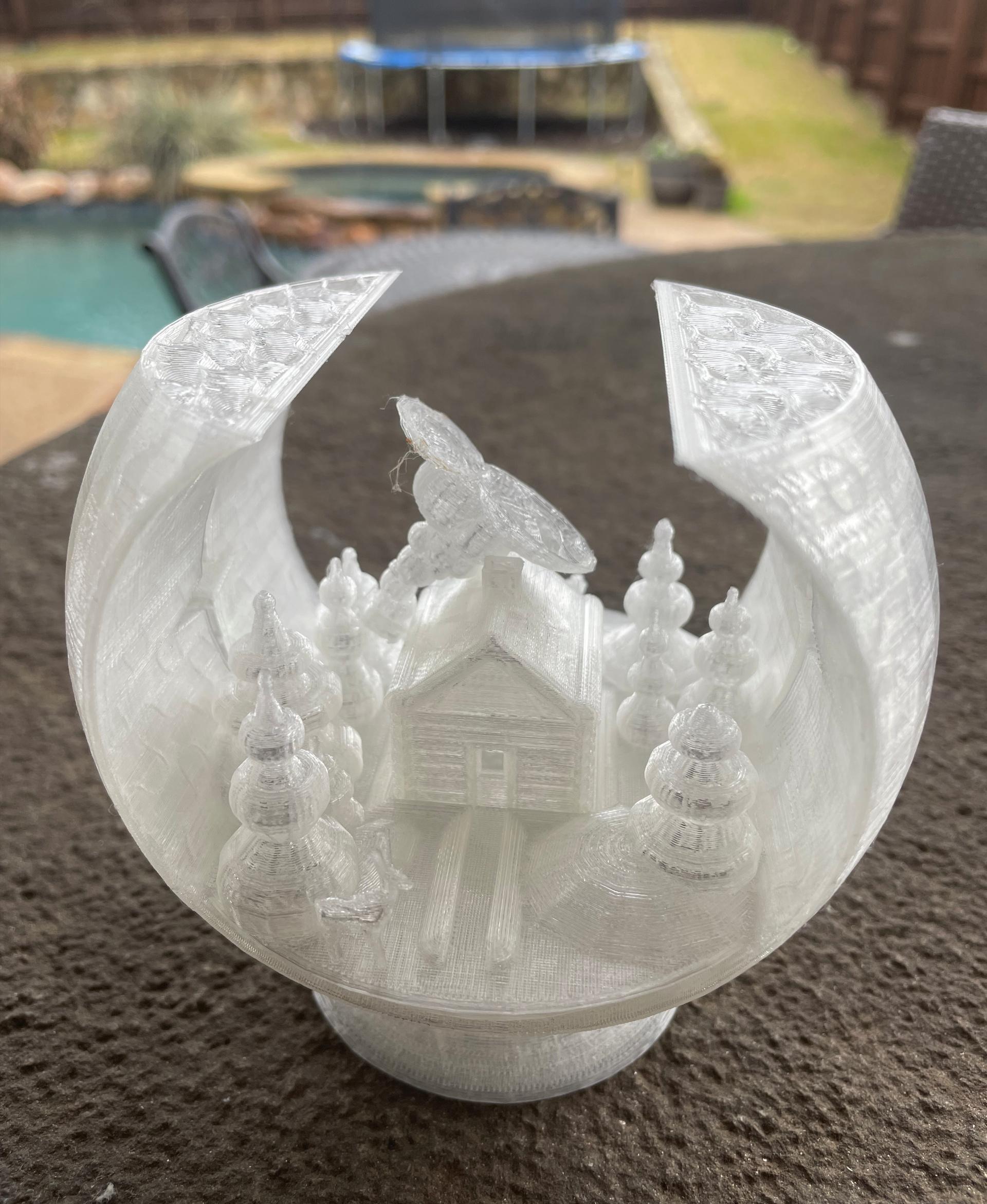 Snow Globe Votive Ornament - Winter Cabin - Chimney broke off the roof only a layer or 2 before it was going to connect with the top part of the globe and reinforce it :( :(  -- about 14 hours into print.. I tried to superglue, and modified the gcode to resume at that layer, but the superglue didn't hold up and broke again.. So bummed, this was gonna look so cook in clear PLA :( - 3d model
