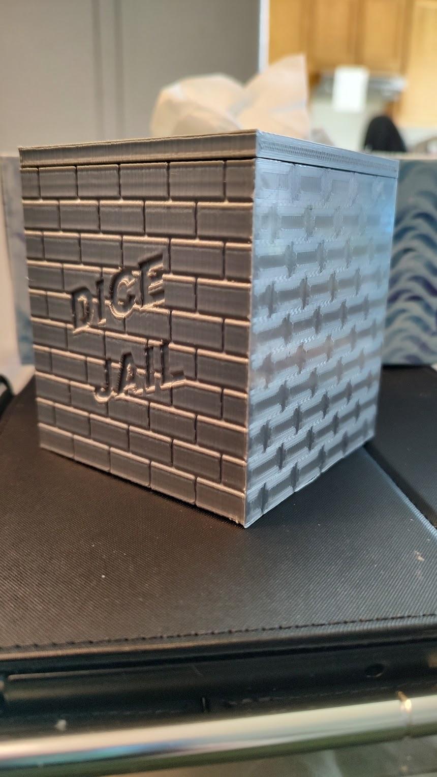 Dice Jail - Side view of my print of the DIce Jail. Printed on an Artillery SIdewinder X2 with Silver Silk PLA. - 3d model