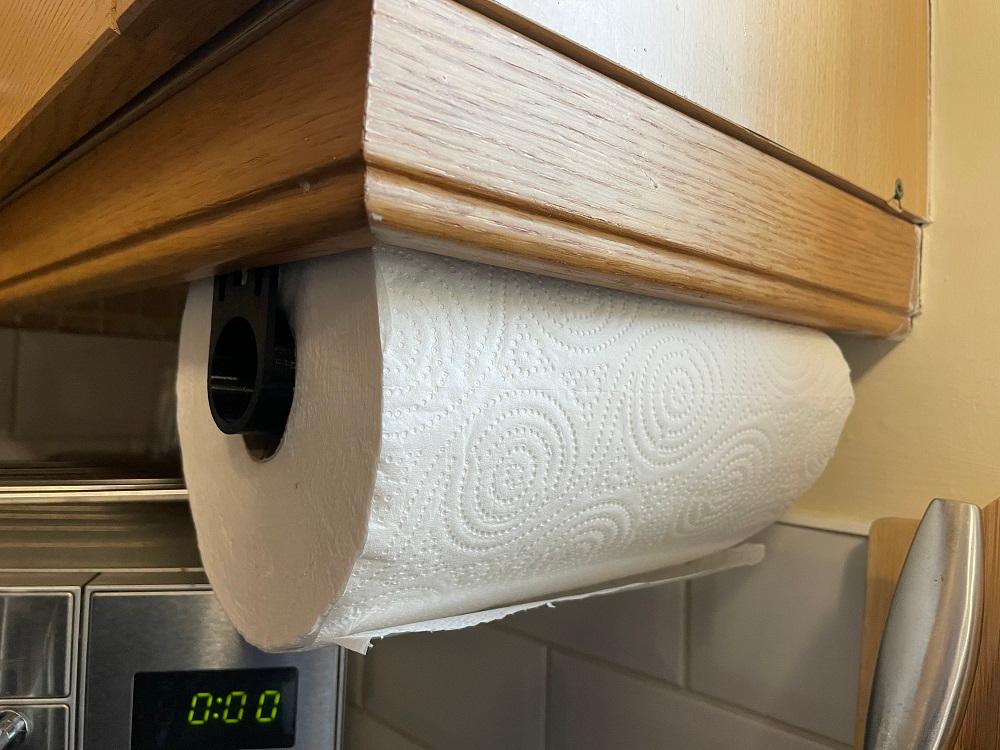 kitchen roll holder - Fitted to the bottom of a kitchen cupboard, just screwed the bracket into the wood. Placed one against the front face and the other at the right distance for a loose hold and so it doesn't need to be bent too much to add/remove the kitchen roll. - 3d model