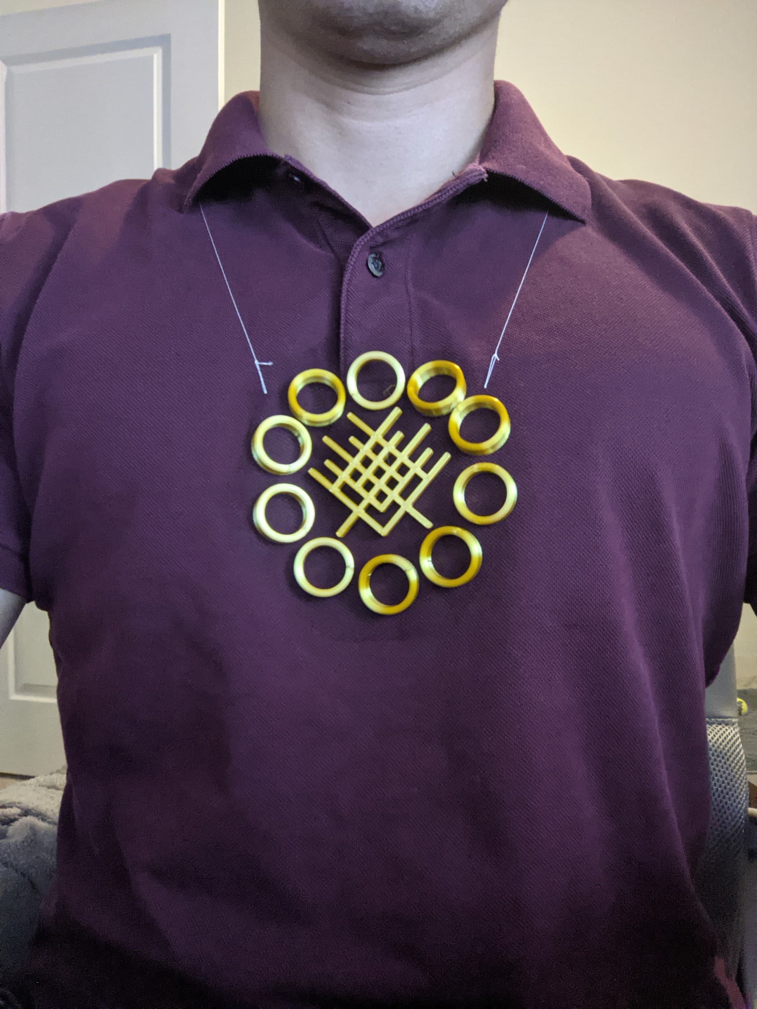 Floating Ten Rings Necklace (3D print on fabric) - The floating ten rings on a necklace - with Shang Chi's super suit flourish in the center.
The Tulle fabric really hides well! - 3d model