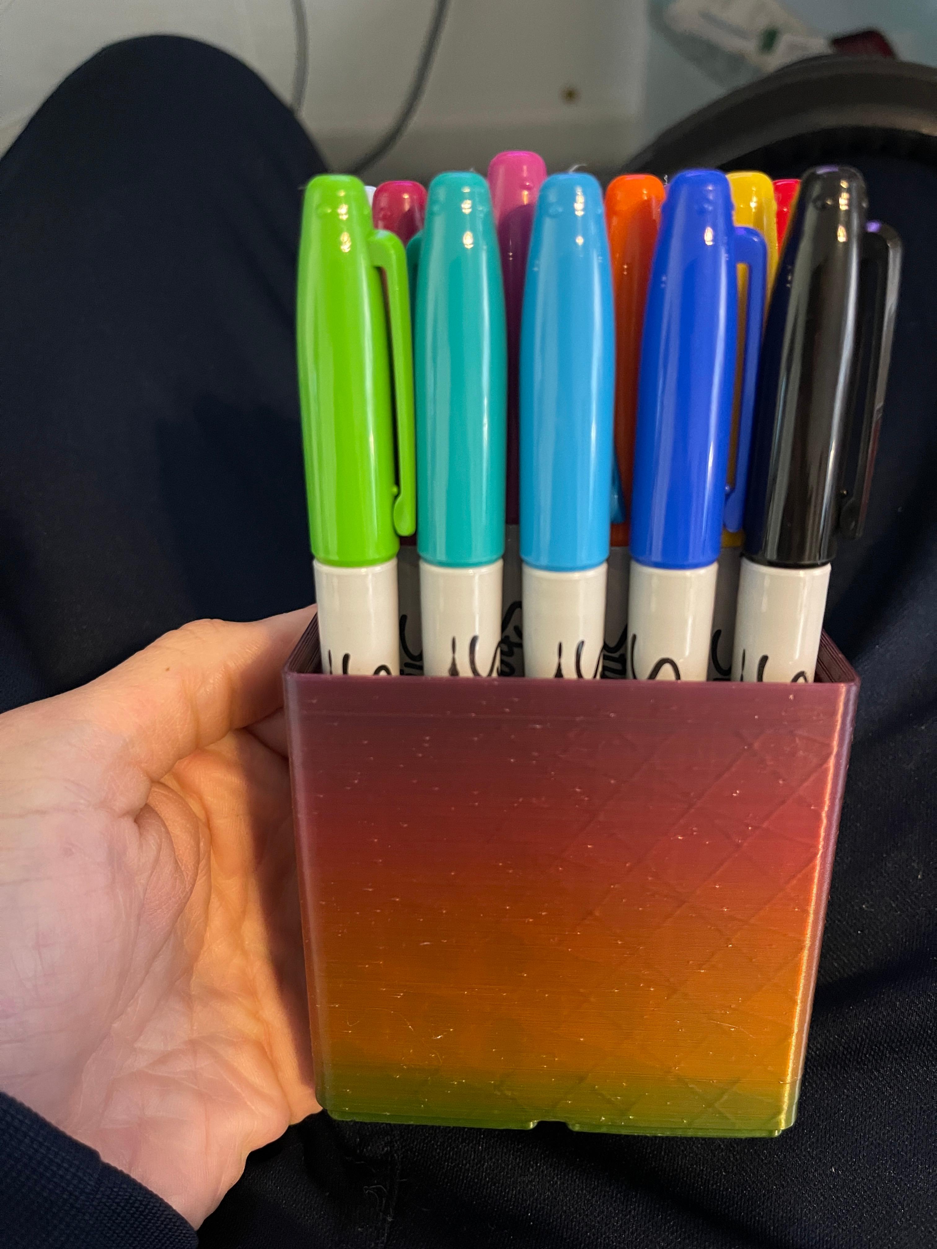 #Gridfinity Sharpie Holders - The sharpies fit nice and snug inside. If you have every hole filled it might be a 2 hand job to grab the ones in the center, but not a big deal. For things a little skinnier like pens/pencils this won't be an issue. I thought it would be too tall overall, but I like where the sharpies sit inside and it has a nice weight balance. - 3d model