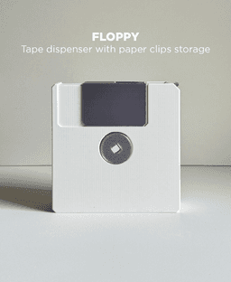 Floppy, tape dispenser with paper clips/push pins storage. 3d model