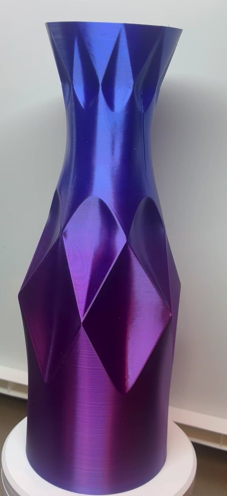 Filament: BL PLA-Silk Aurora Purple. I reduced outer speed to 40 mm/sec (as BL recommended) and layer lines are almost invisible.