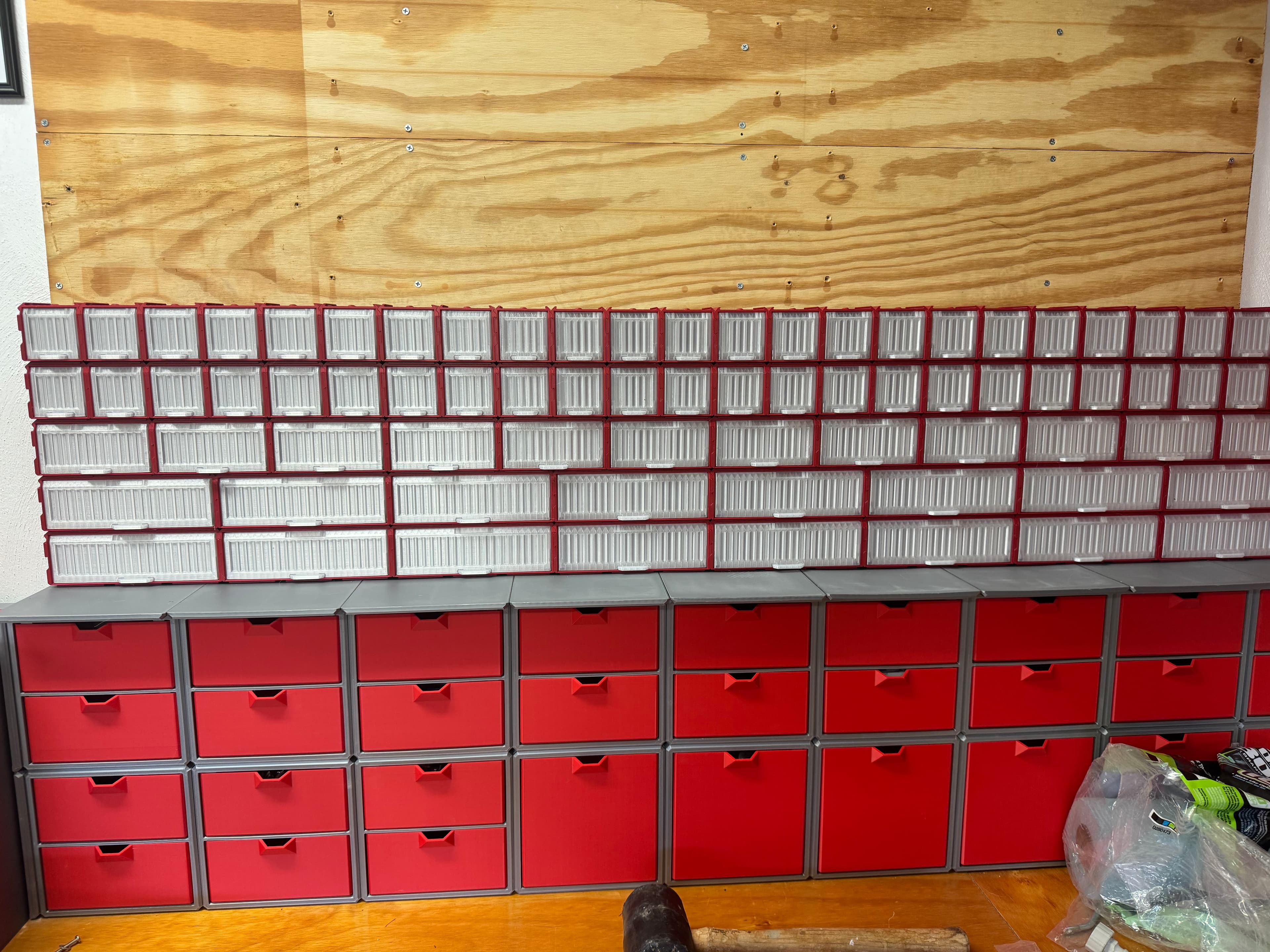 This is my garage parts set up. Larger boxes are from a kickstarter I supported for bigger parts. The cargo containers need a shelf on the bottom to allow the first row to tip out. I would like to add 3x2 and 2x2 containers one container deep but also add deeper containers for all of them. 3x2x2, 3x2x3, 2x2x2, & 2x2x3.