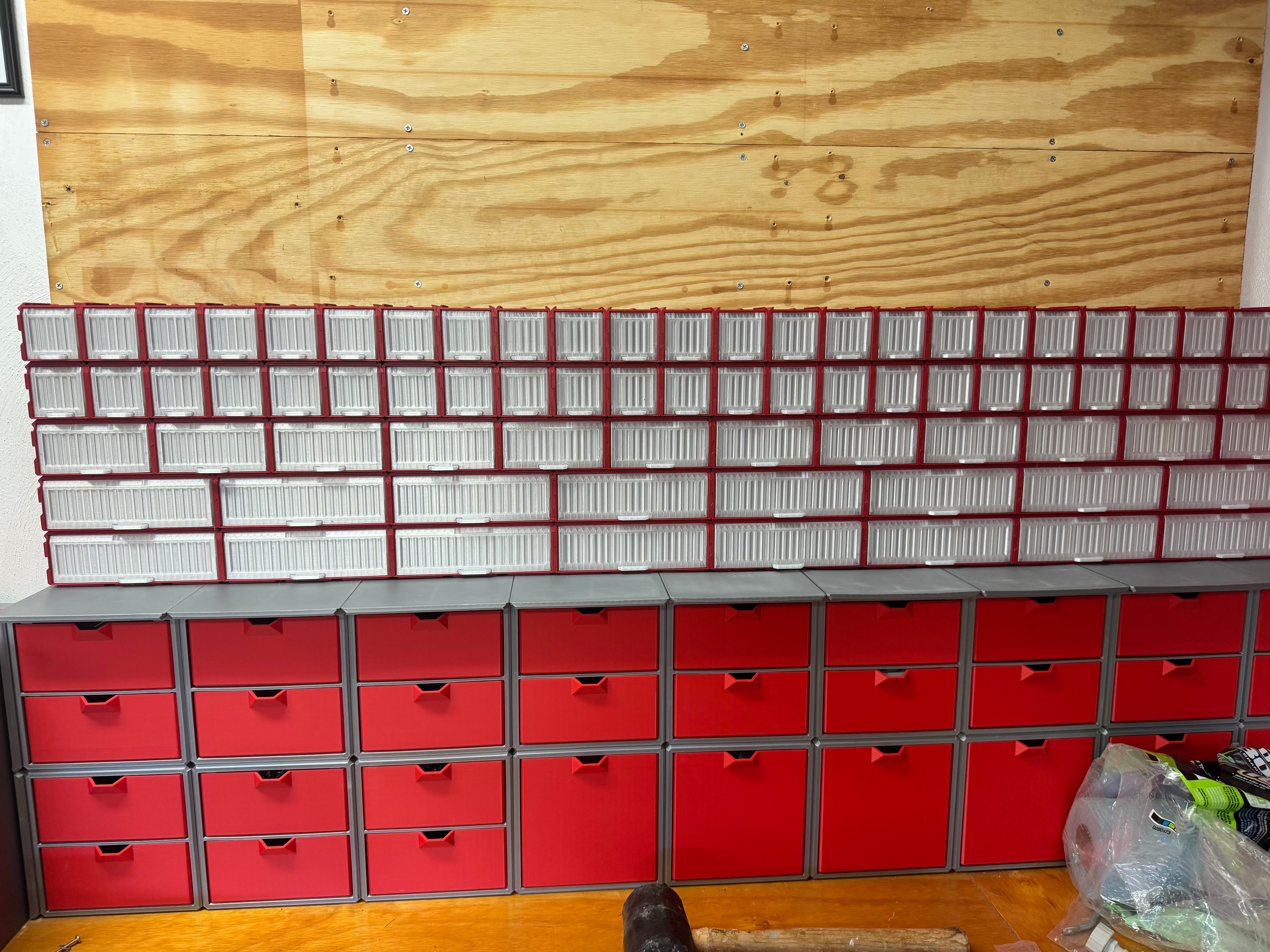 This is my garage parts set up. Larger boxes are from a kickstarter I supported for bigger parts. The cargo containers need a shelf on the bottom to allow the first row to tip out. I would like to add 3x2 and 2x2 containers one container deep but also add deeper containers for all of them. 3x2x2, 3x2x3, 2x2x2, & 2x2x3.
